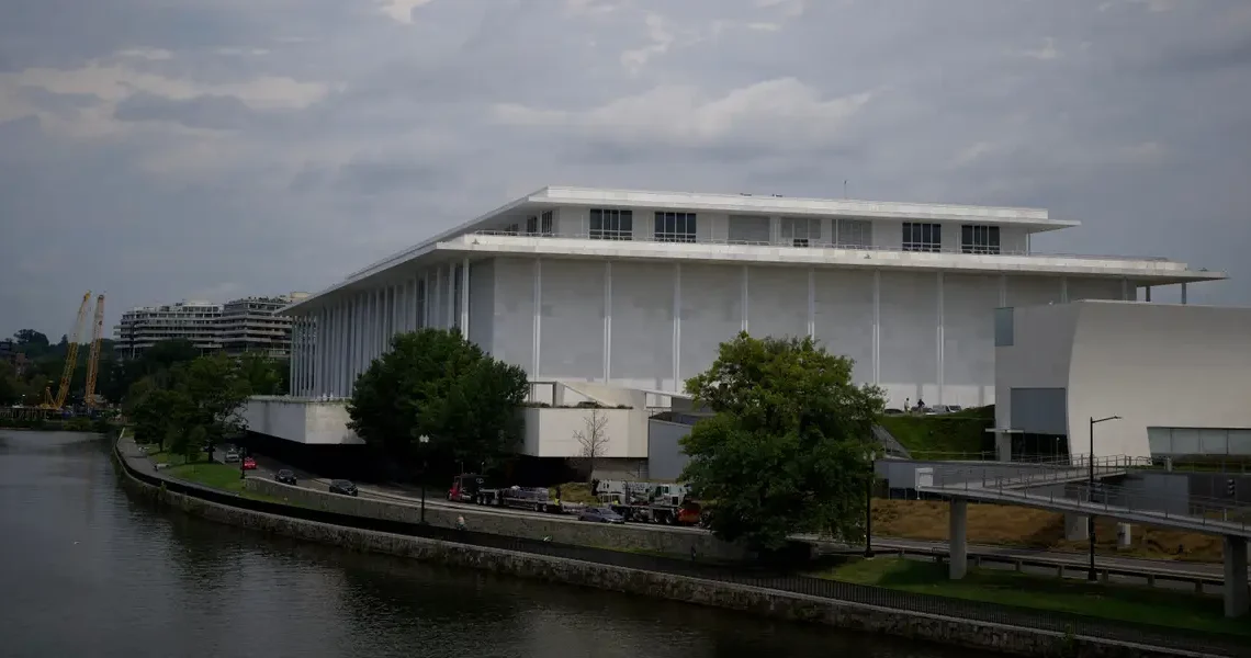 The Kennedy Center’s board voted to close until Trump’s name is added. Here’s a look at the history behind the landmark.