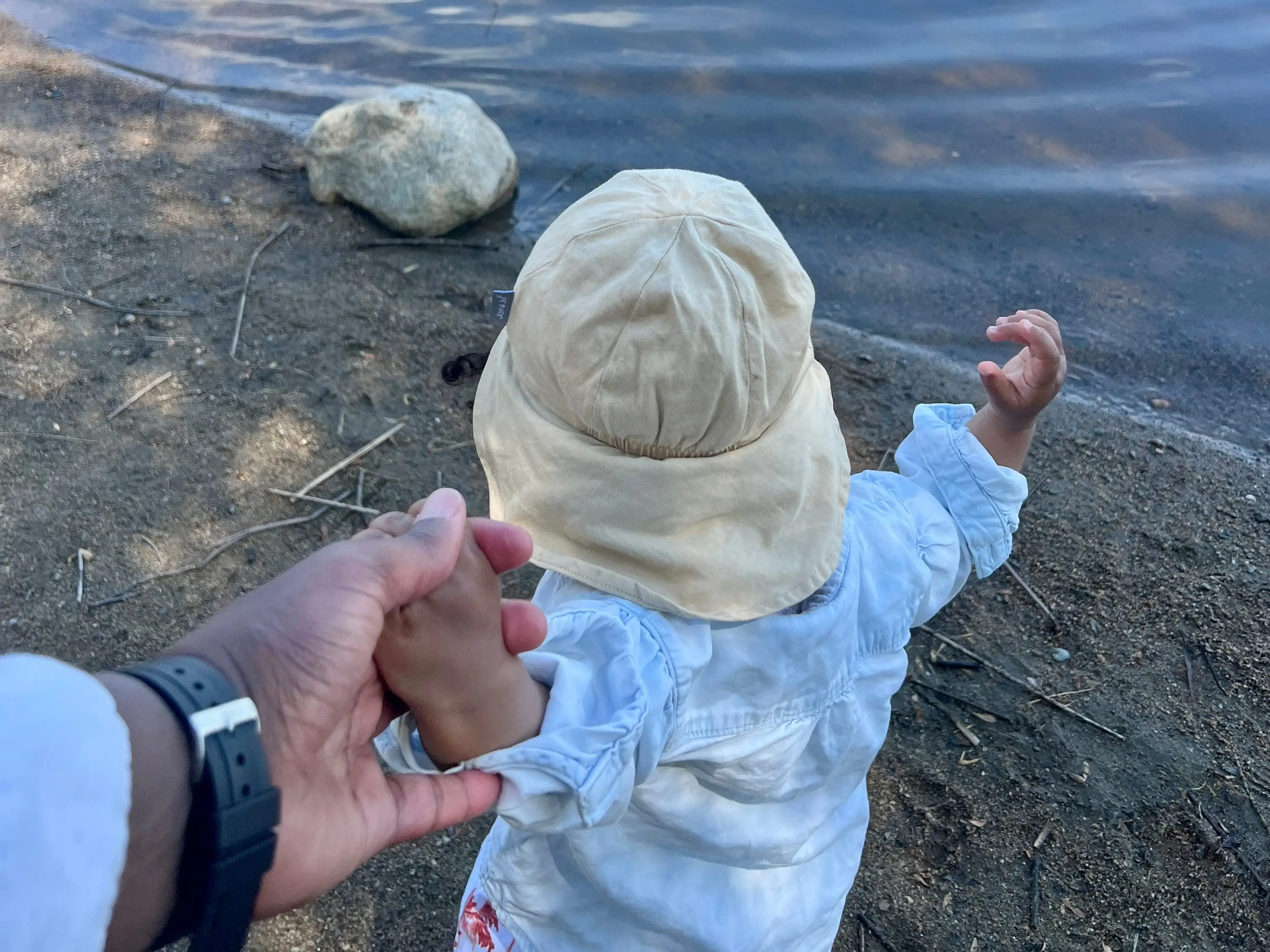 Baby trying to get in the water