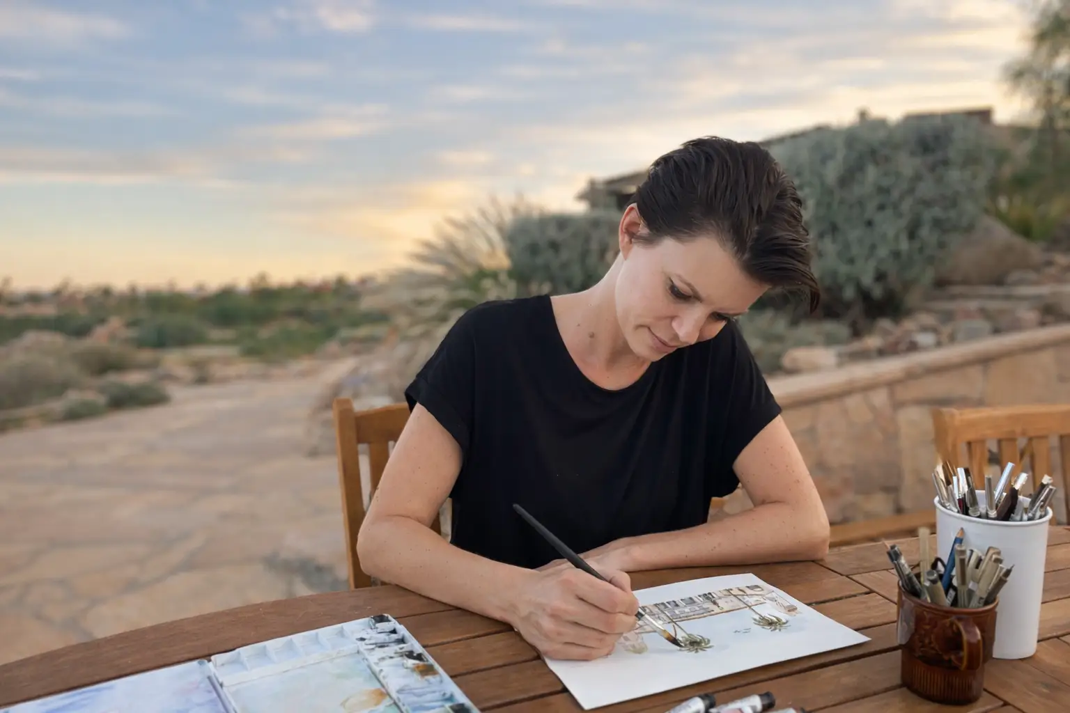 Sara Wilczynska works on a piece of art
