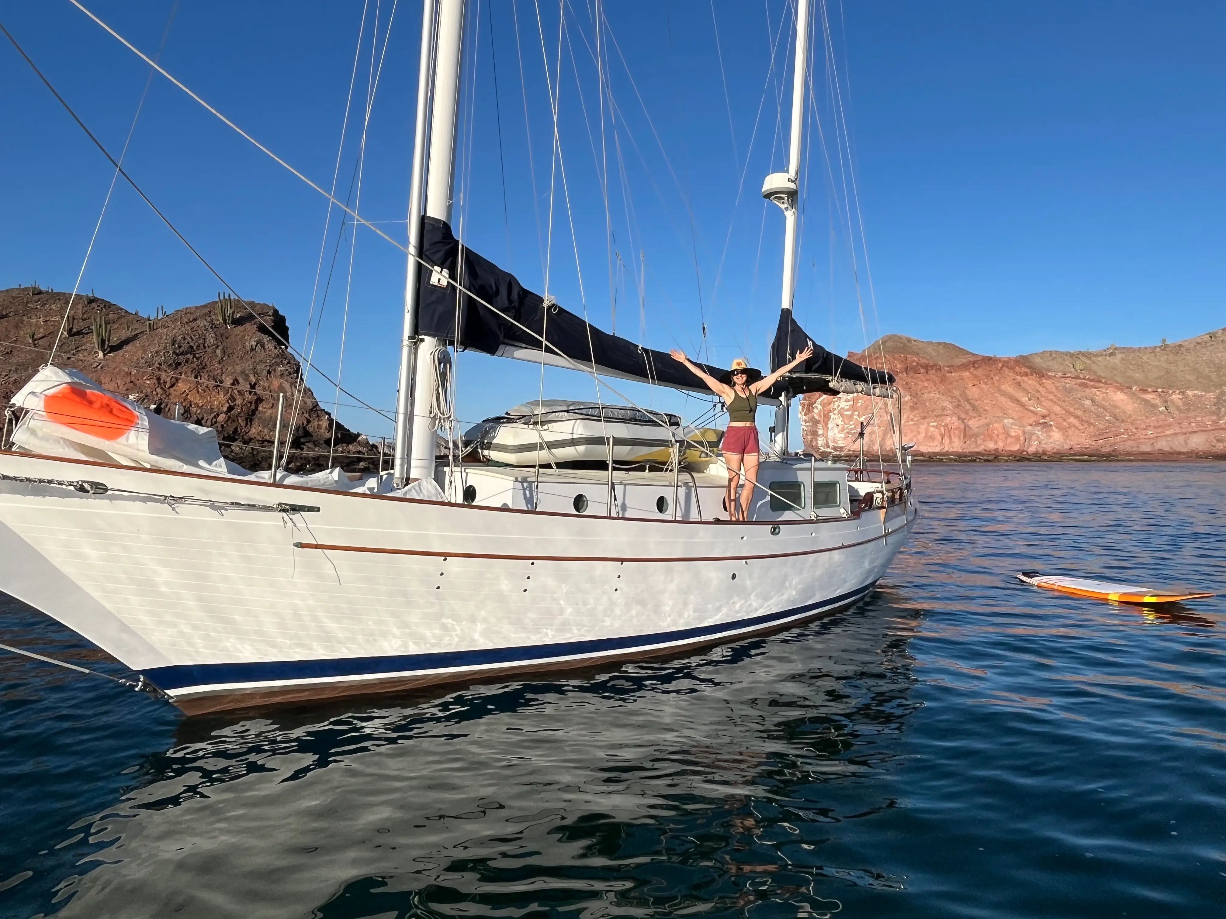 Person on boat in blue waters