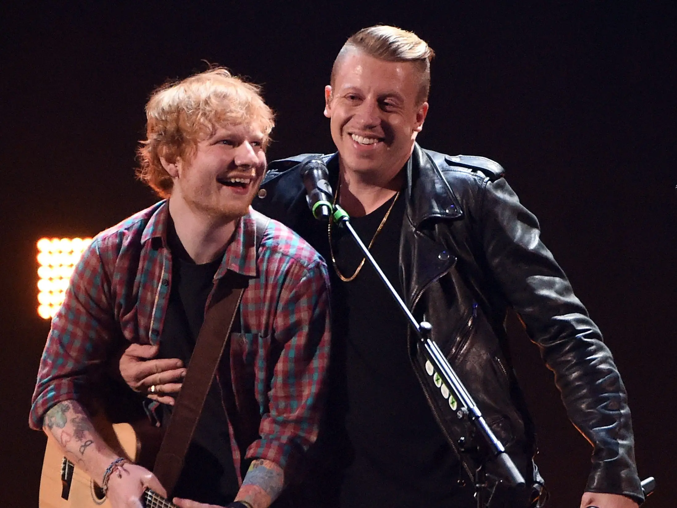 Singer/songwriter Ed Sheeran (L) and rapper Macklemore perform during the 2014 iHeartRadio Music Festival at the MGM Grand Garden Arena on September 20, 2014 in Las Vegas, Nevada.