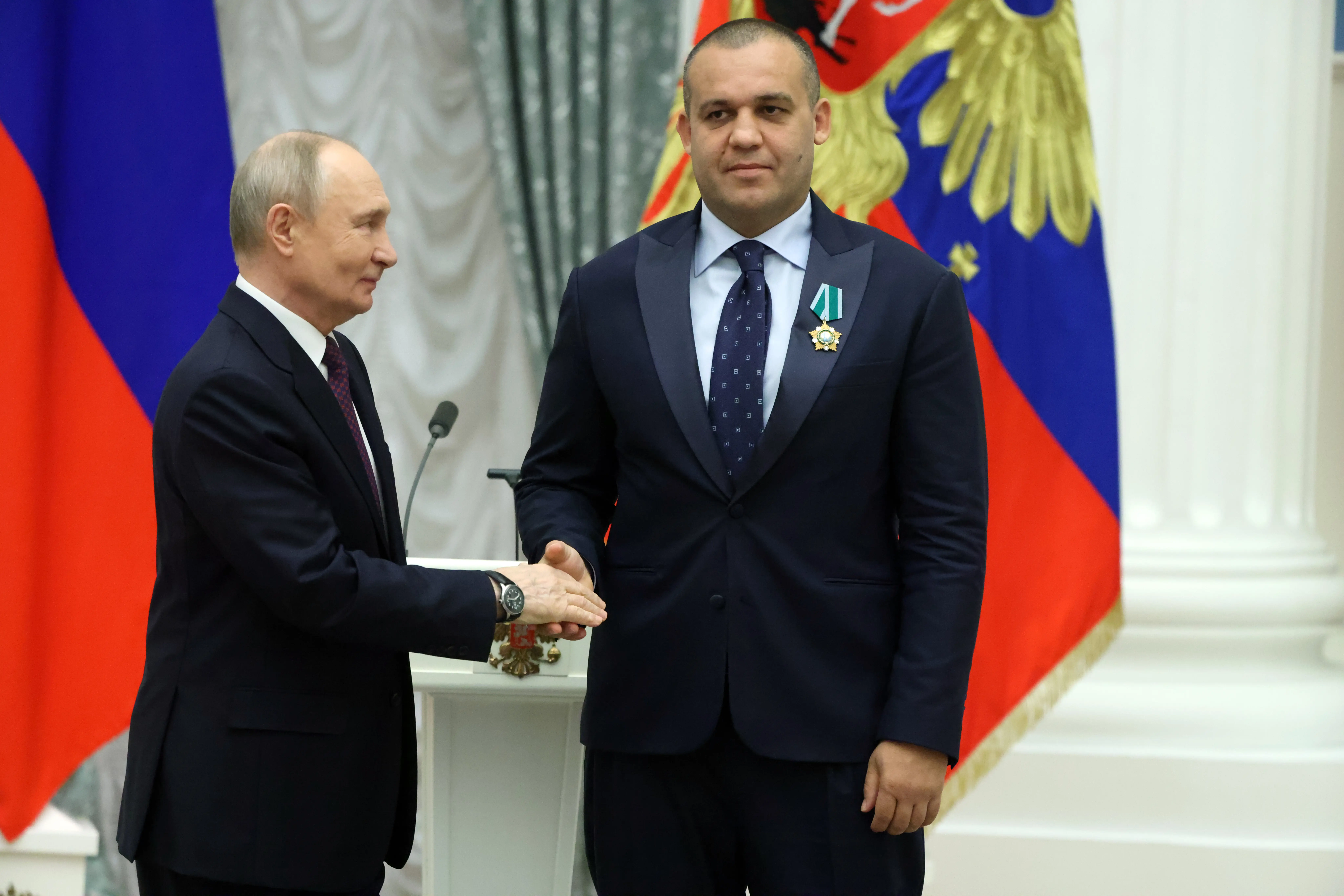 Russian President Vladimir Putin with Umar Kremlev.