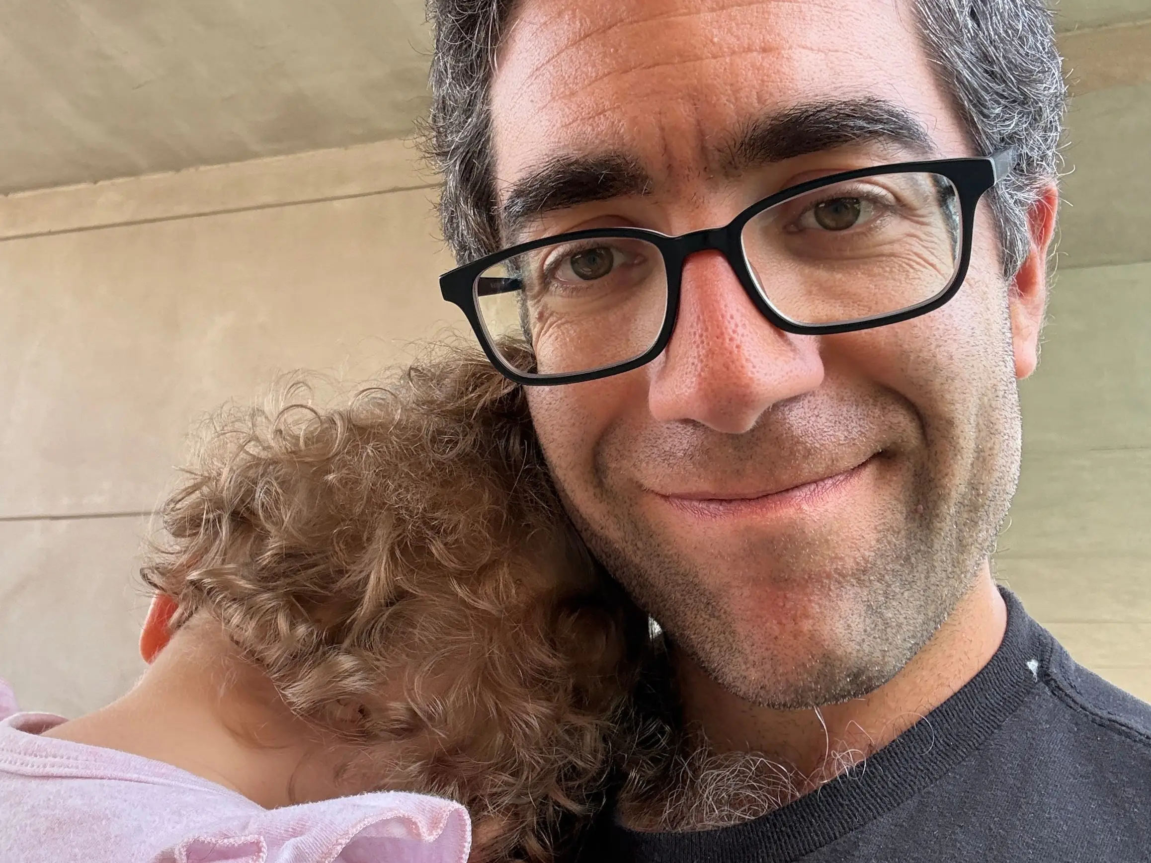 Dad holding child