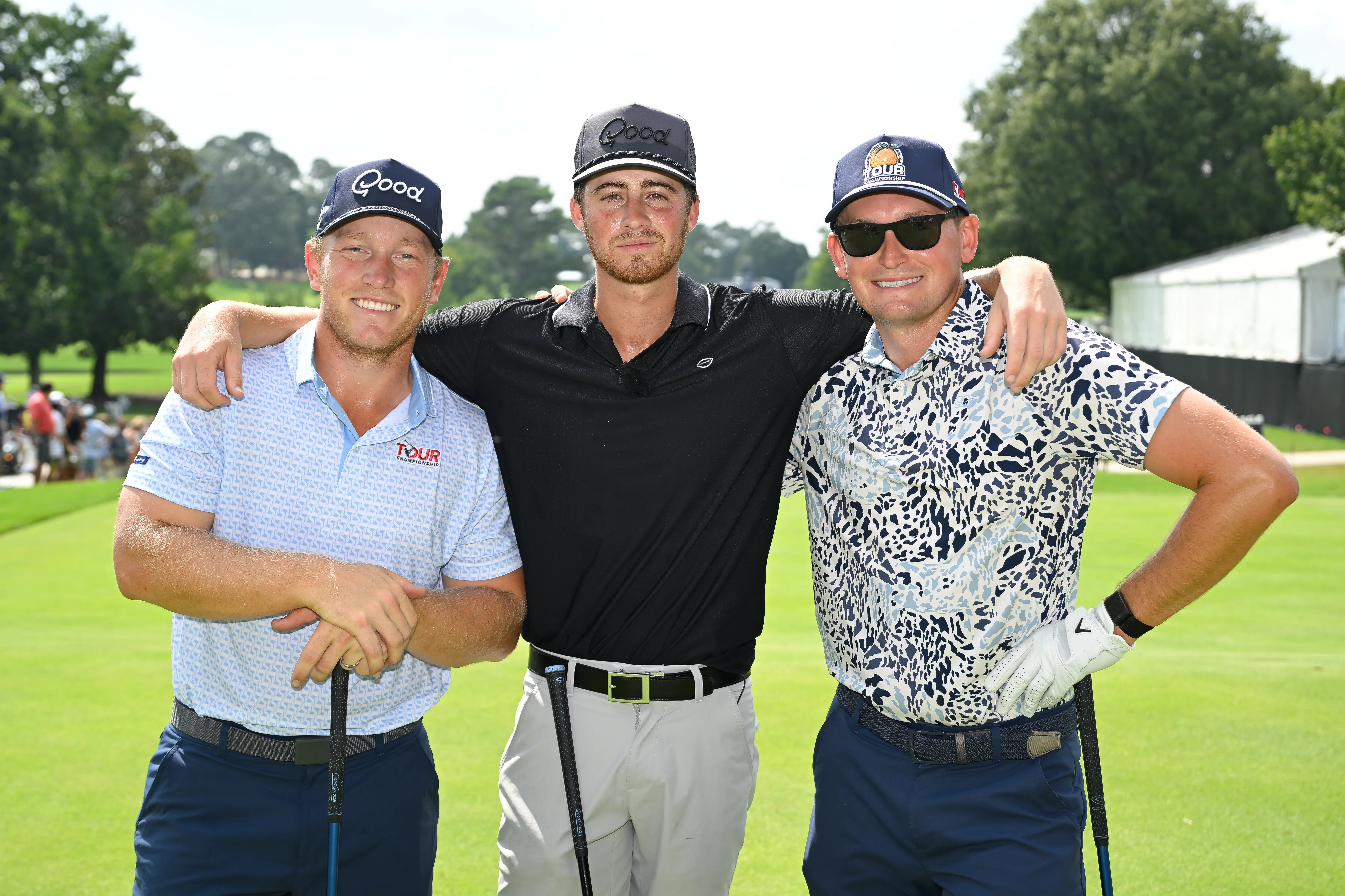Garrett Clark, center, of Good Good