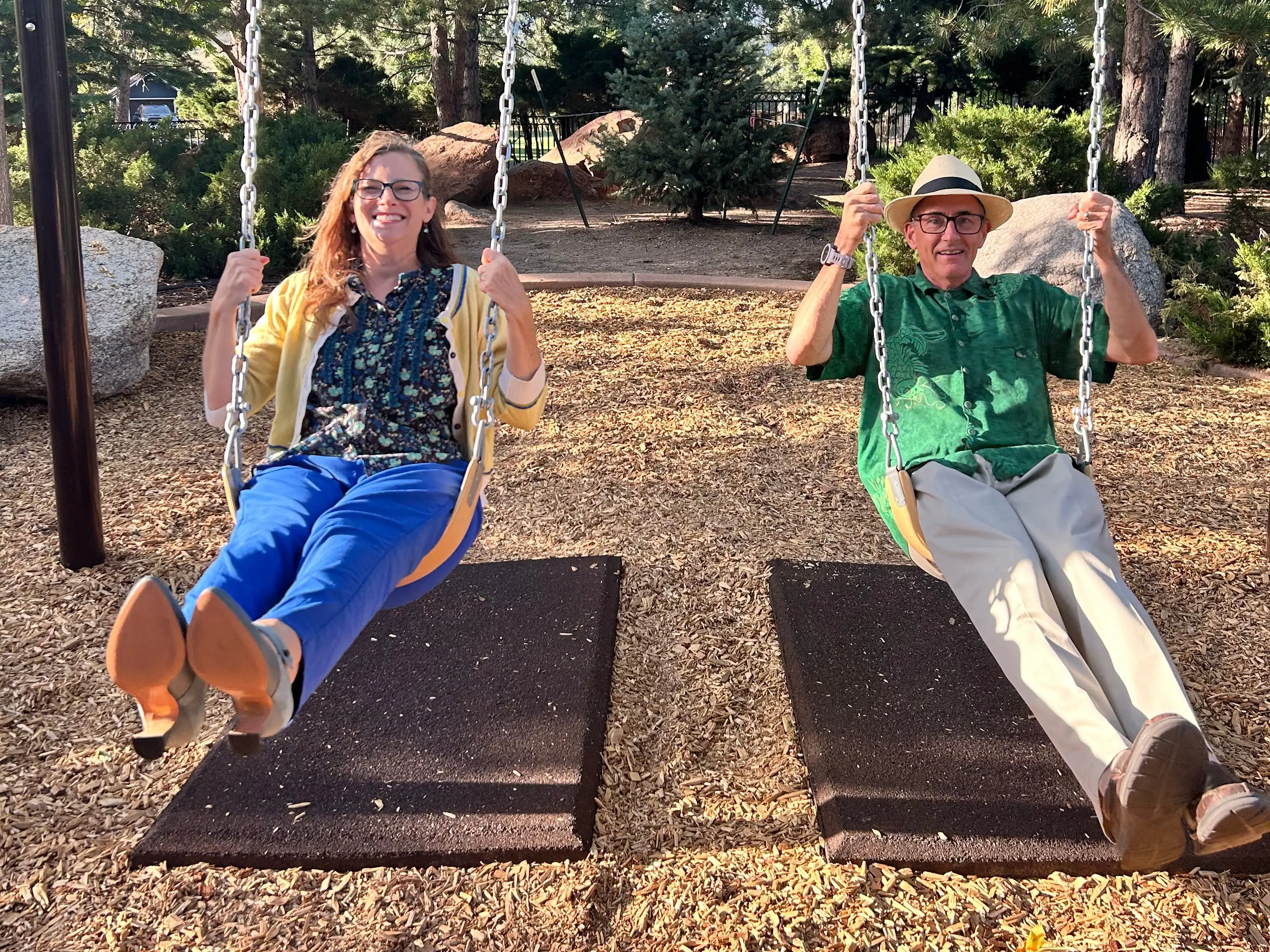 Natalie and James Strawn on swings