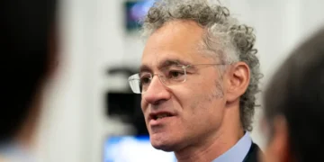 Alex Karp says the AI safety debate is really about nationalizing AI labs