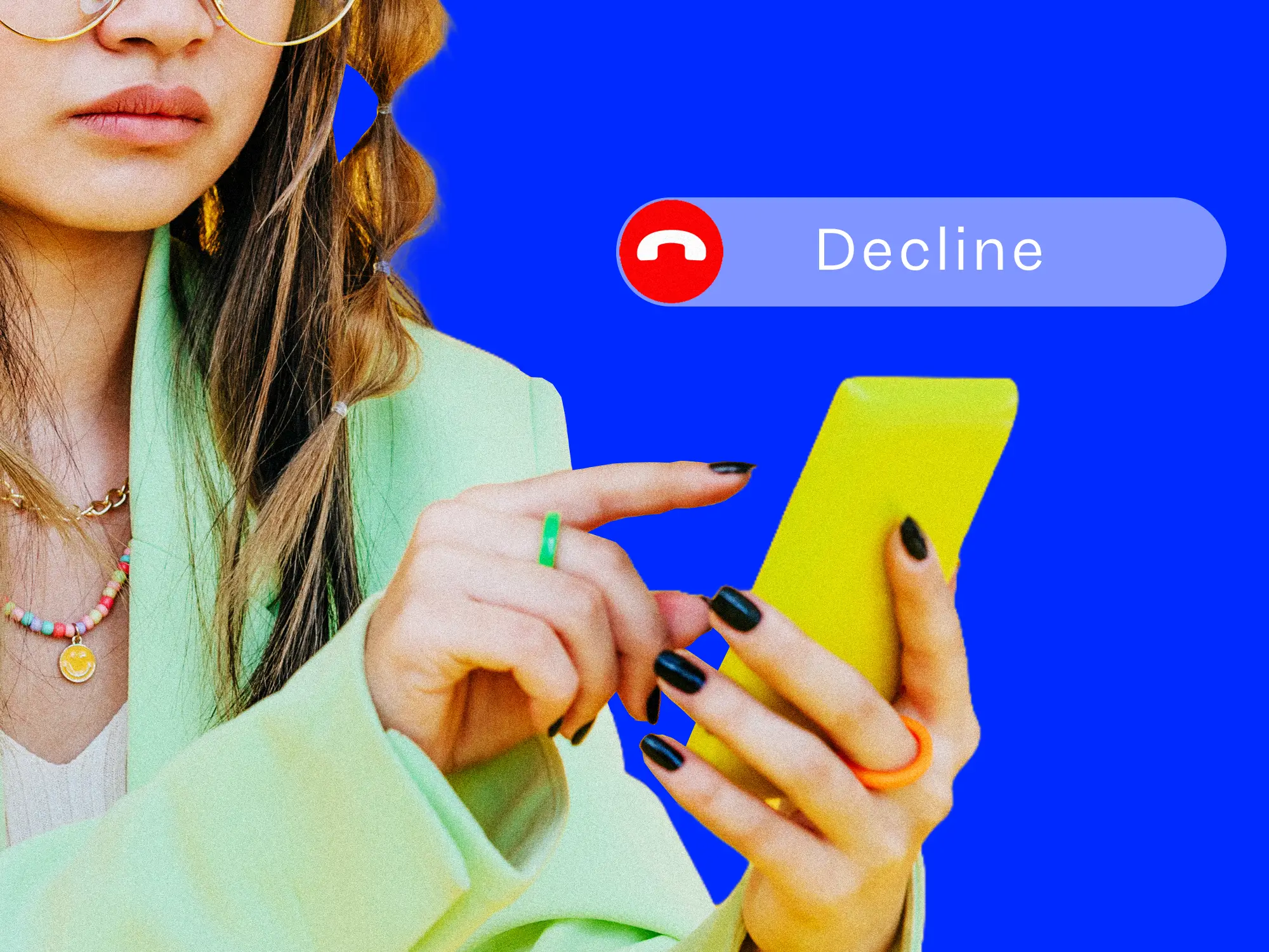A young Gen Z person looking at a phone with a Decline call interface