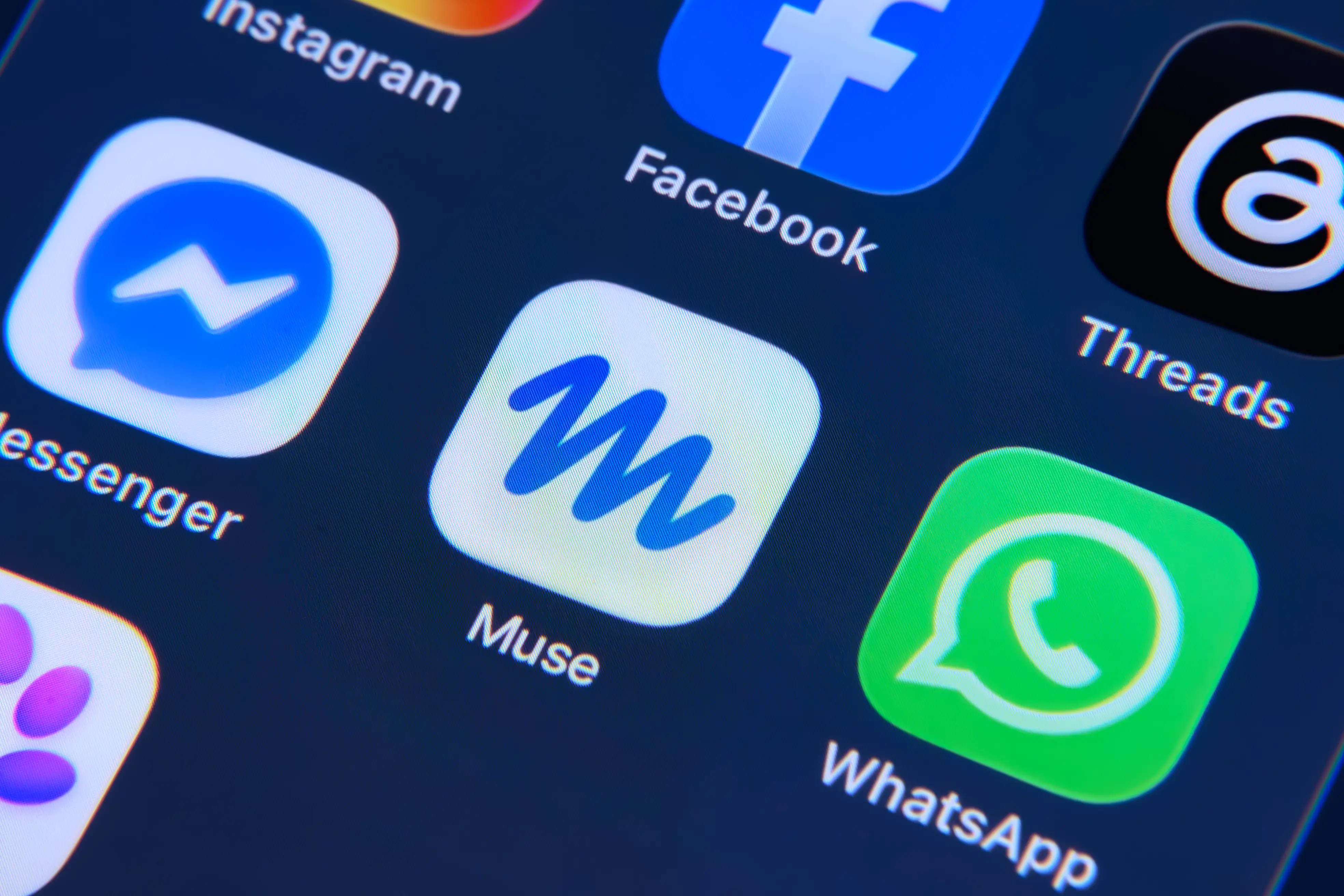 Close-up smartphone screen showing the Muse app icon among Facebook, Threads, WhatsApp, Messenger, and Instagram icons.