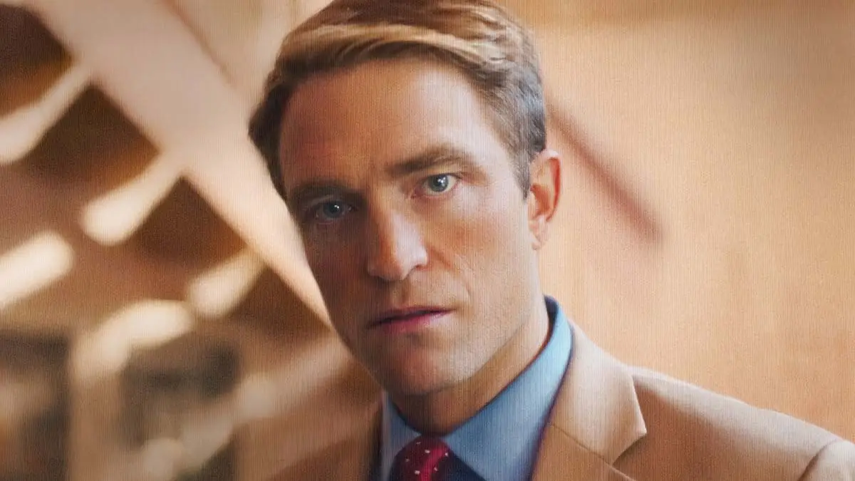 Robert Pattinson in a cream suit