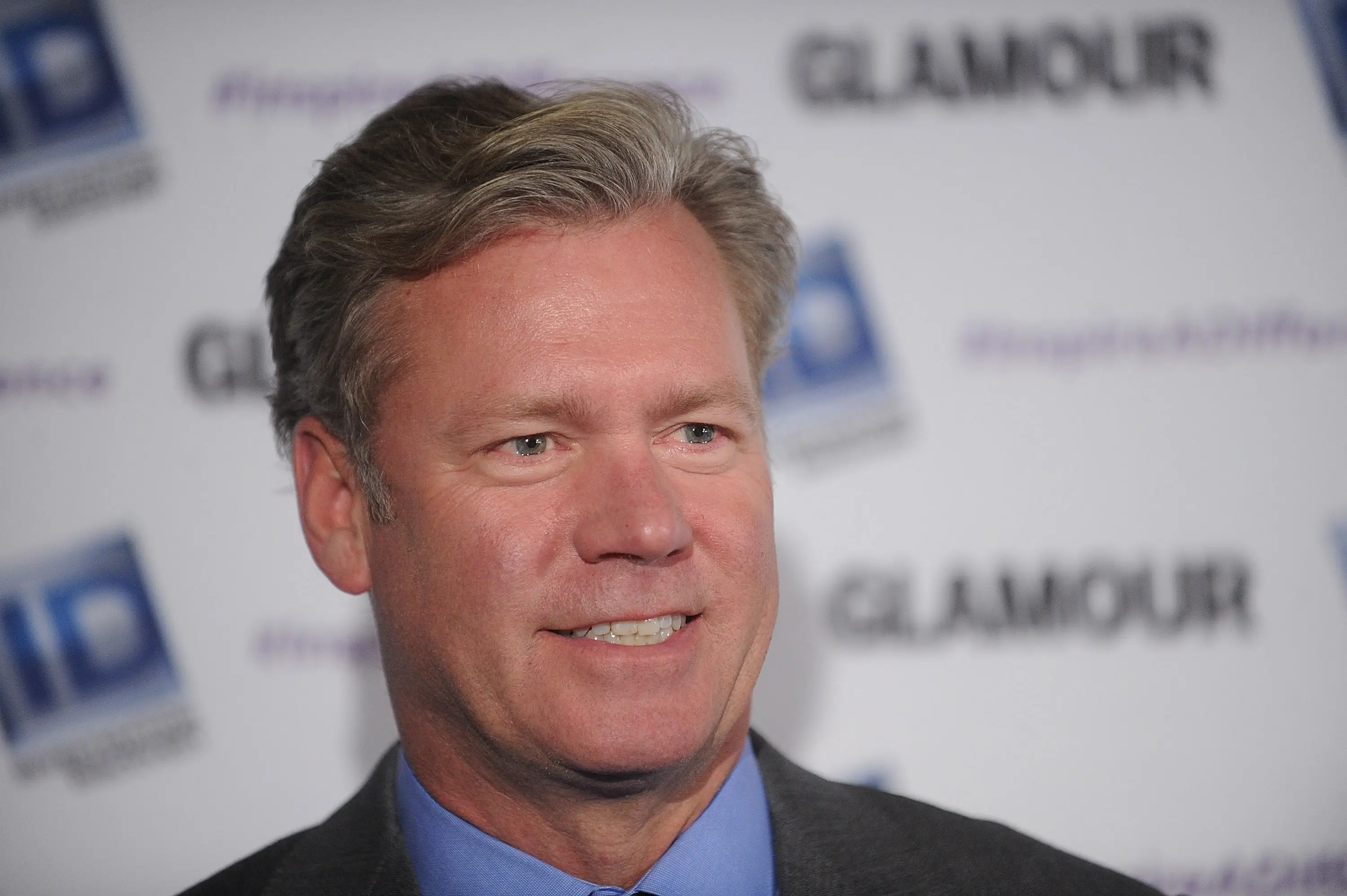 Chris Hansen in a grey suit