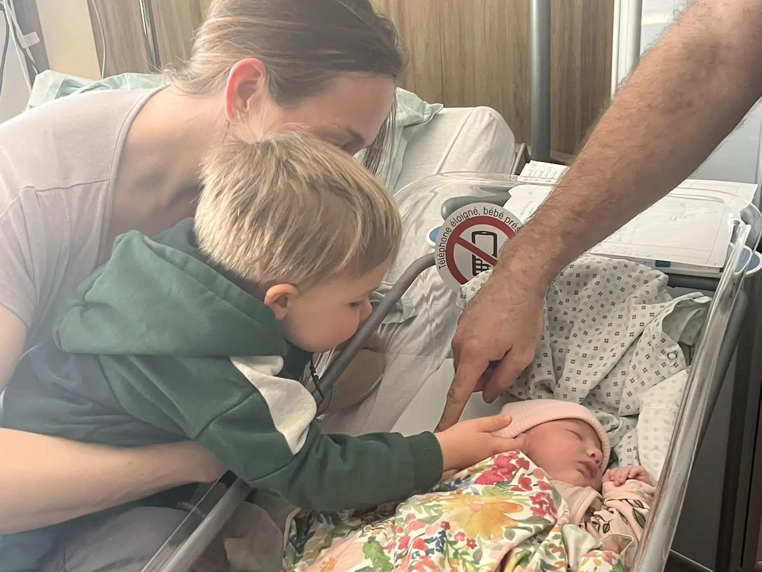 Big brother meeting baby