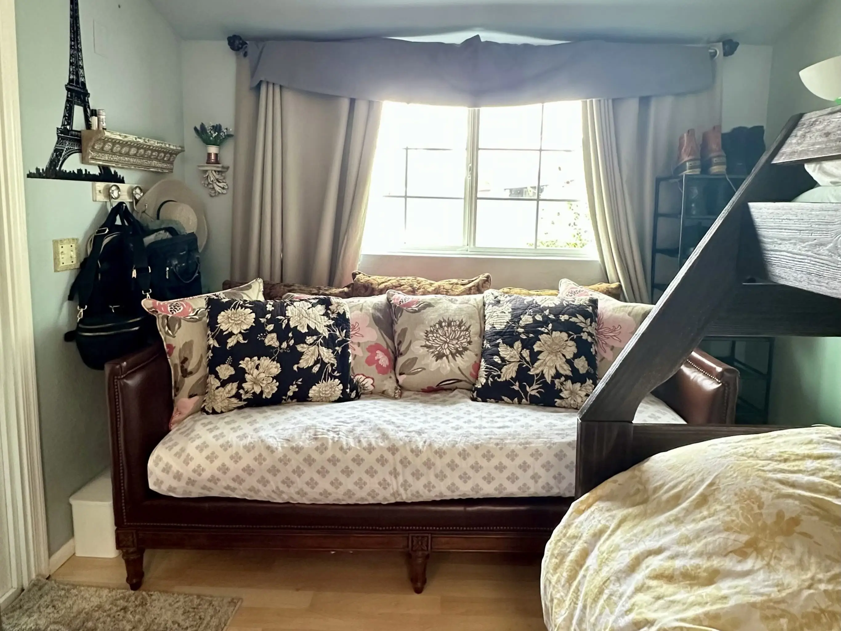 sofa in front of a window in converted garage