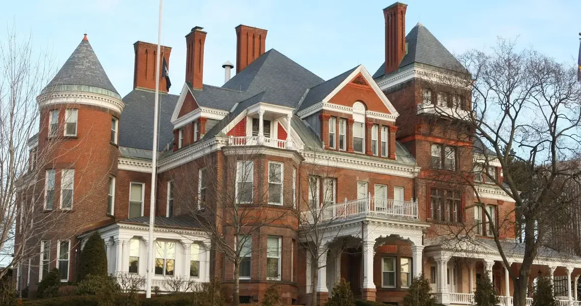 Grand staircases, state-shaped pools, and bowling alleys in the basement: See what the governor’s mansion looks like in every state