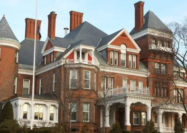 Grand staircases, state-shaped pools, and bowling alleys in the basement: See what the governor’s mansion looks like in every state