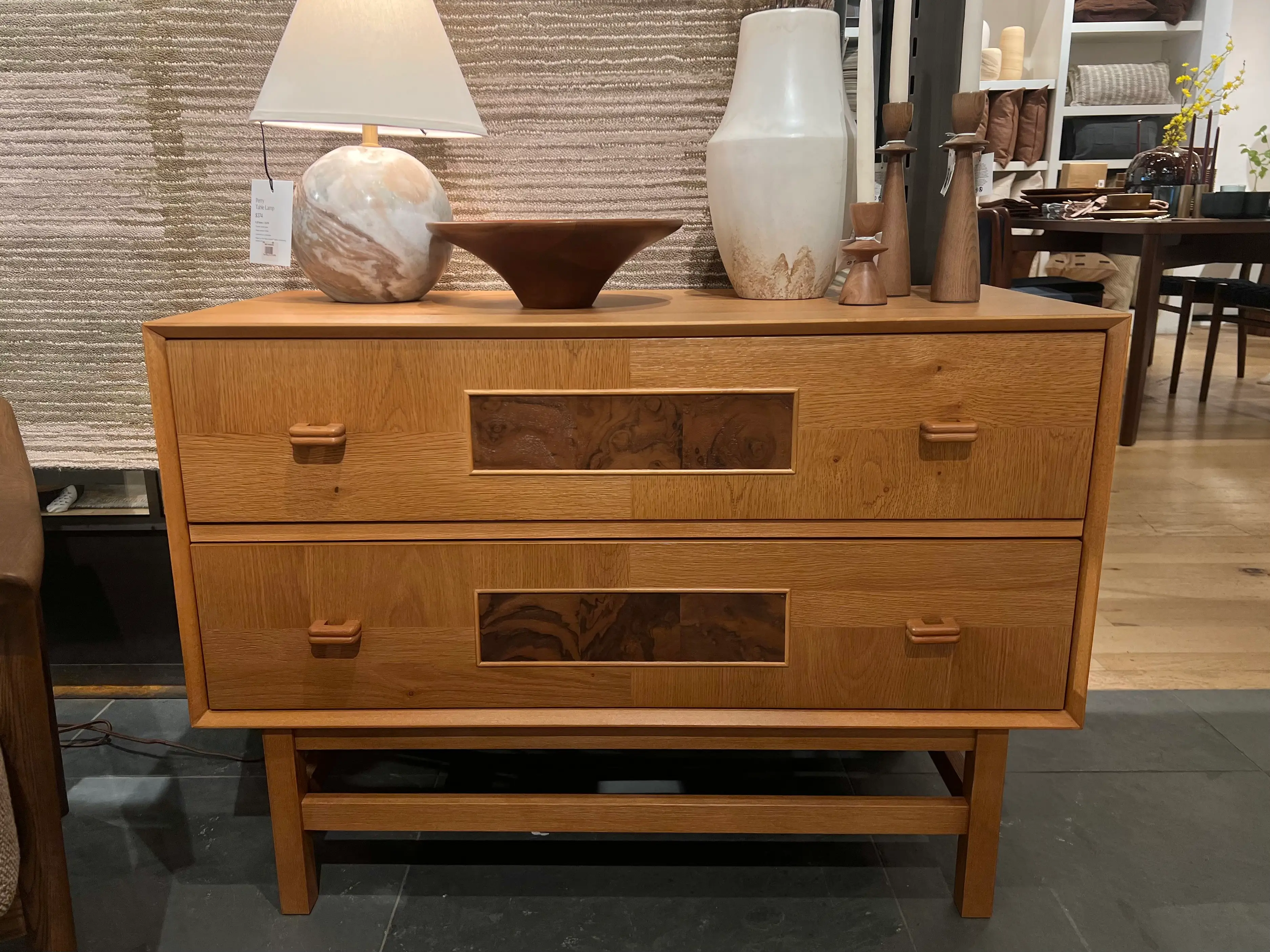 A wooden console with two drawers.