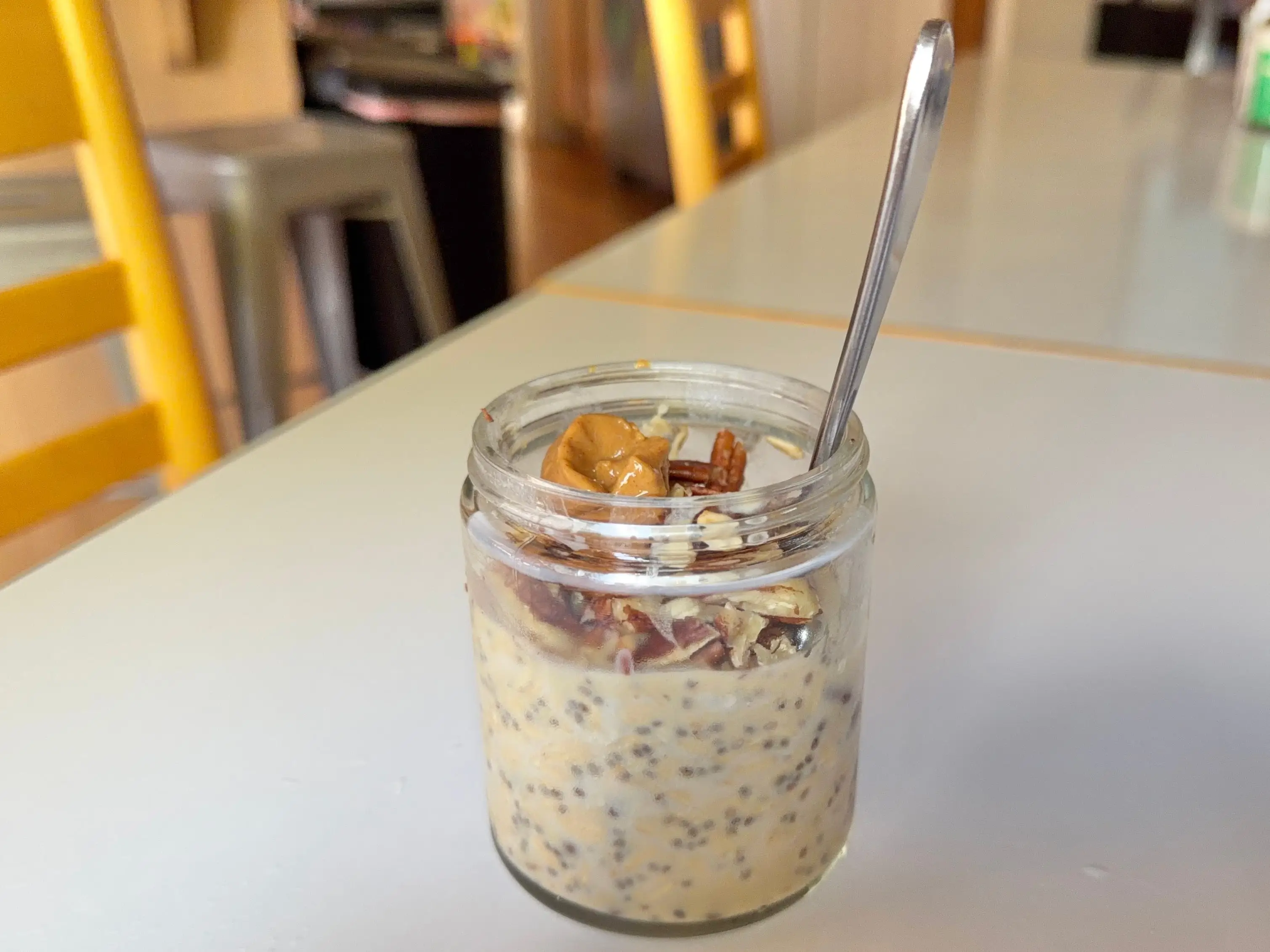 overnight oats in jar with spoon in it