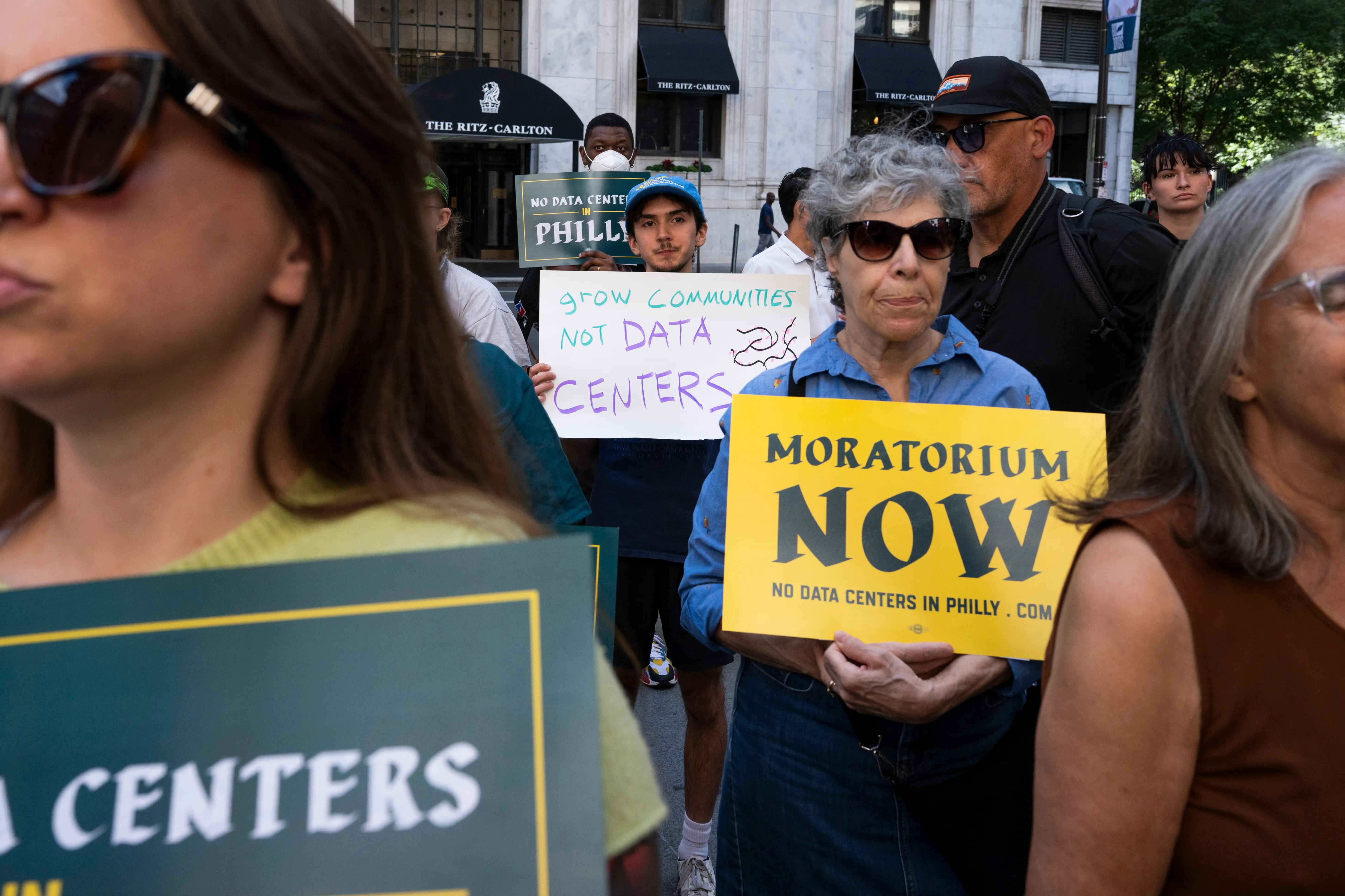 Demonstrators rally during a protest calling for a city wide data center moratorium outside City Hall in Philadelphia, Pennsylvania, US, on Monday, Sept. 14, 2026.