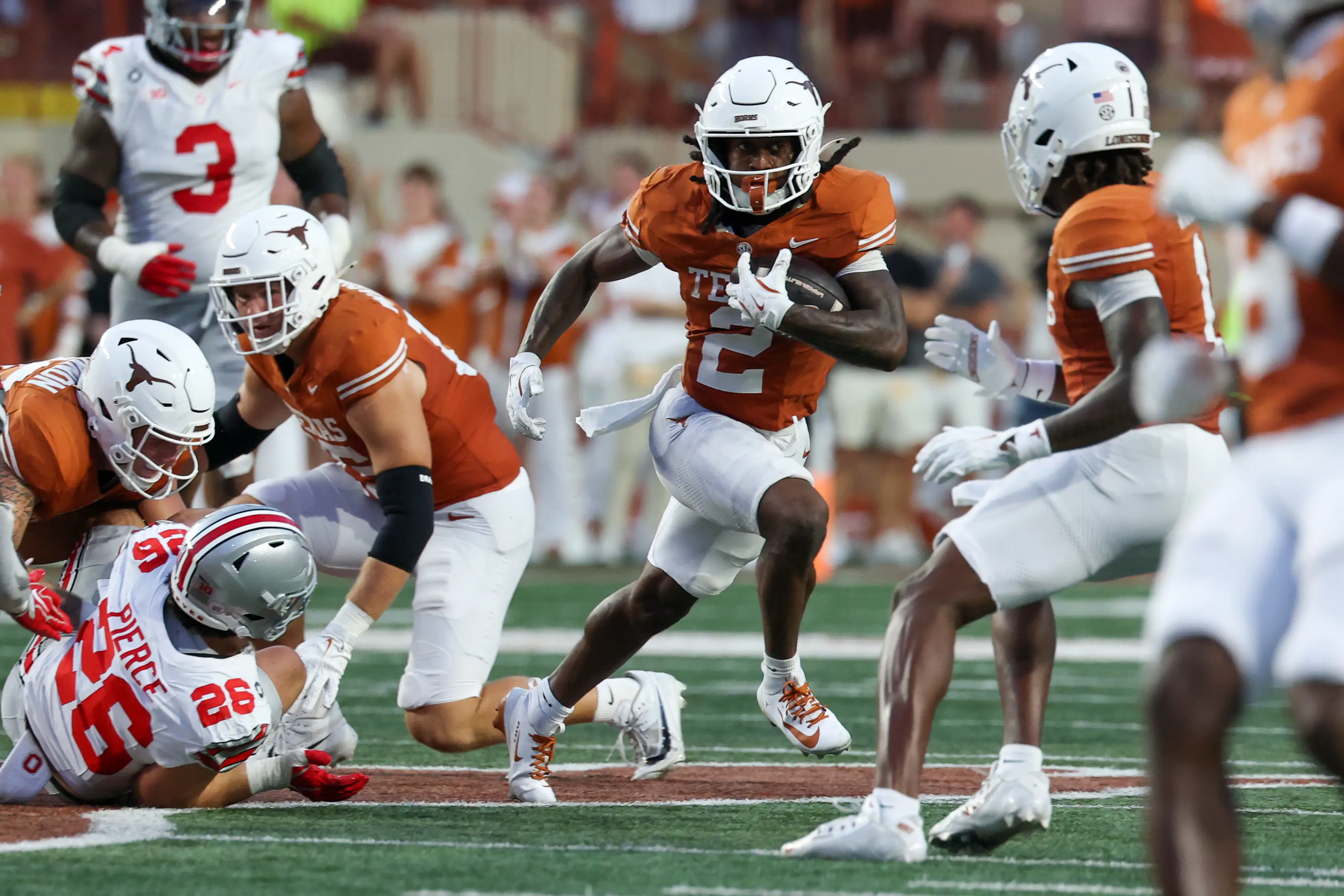 Texas running back Hollywood Smothers springs down the field