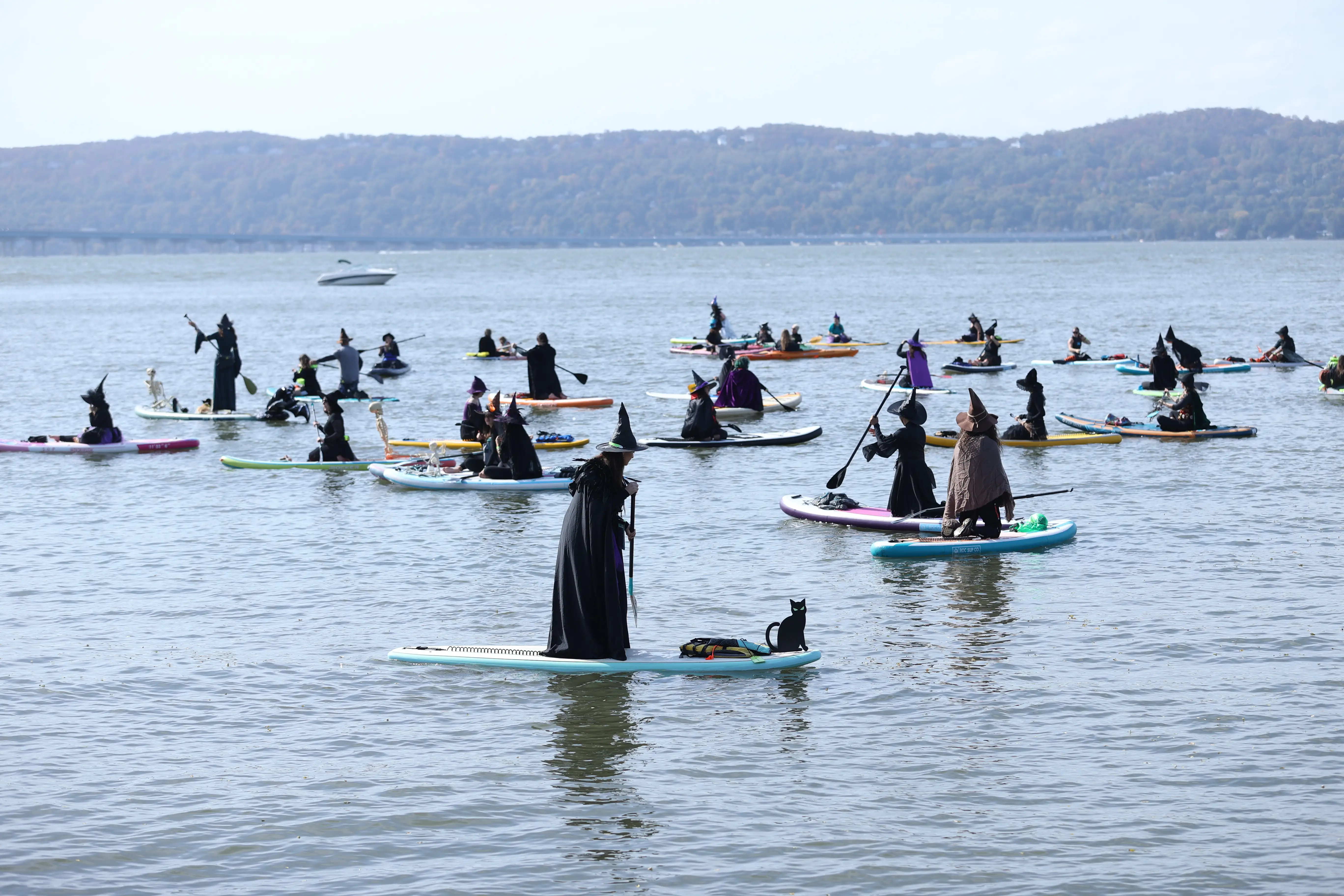 Dozens of witches and warlocks took to the Hudson River during the annual SUP Witches Festival in Sleepy Hollow, New York, on October 19, 2025.