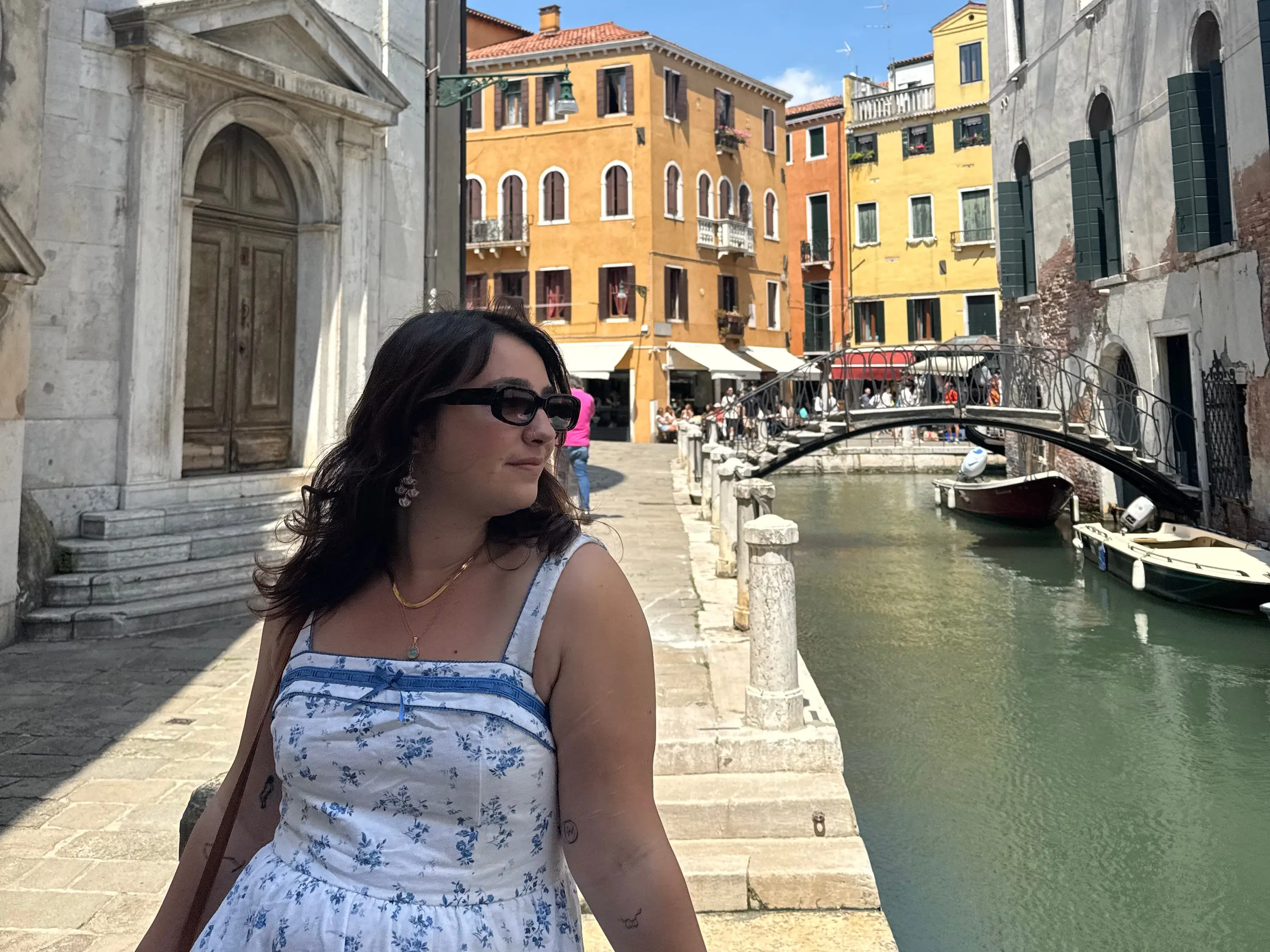 A woman walking in Venice.
