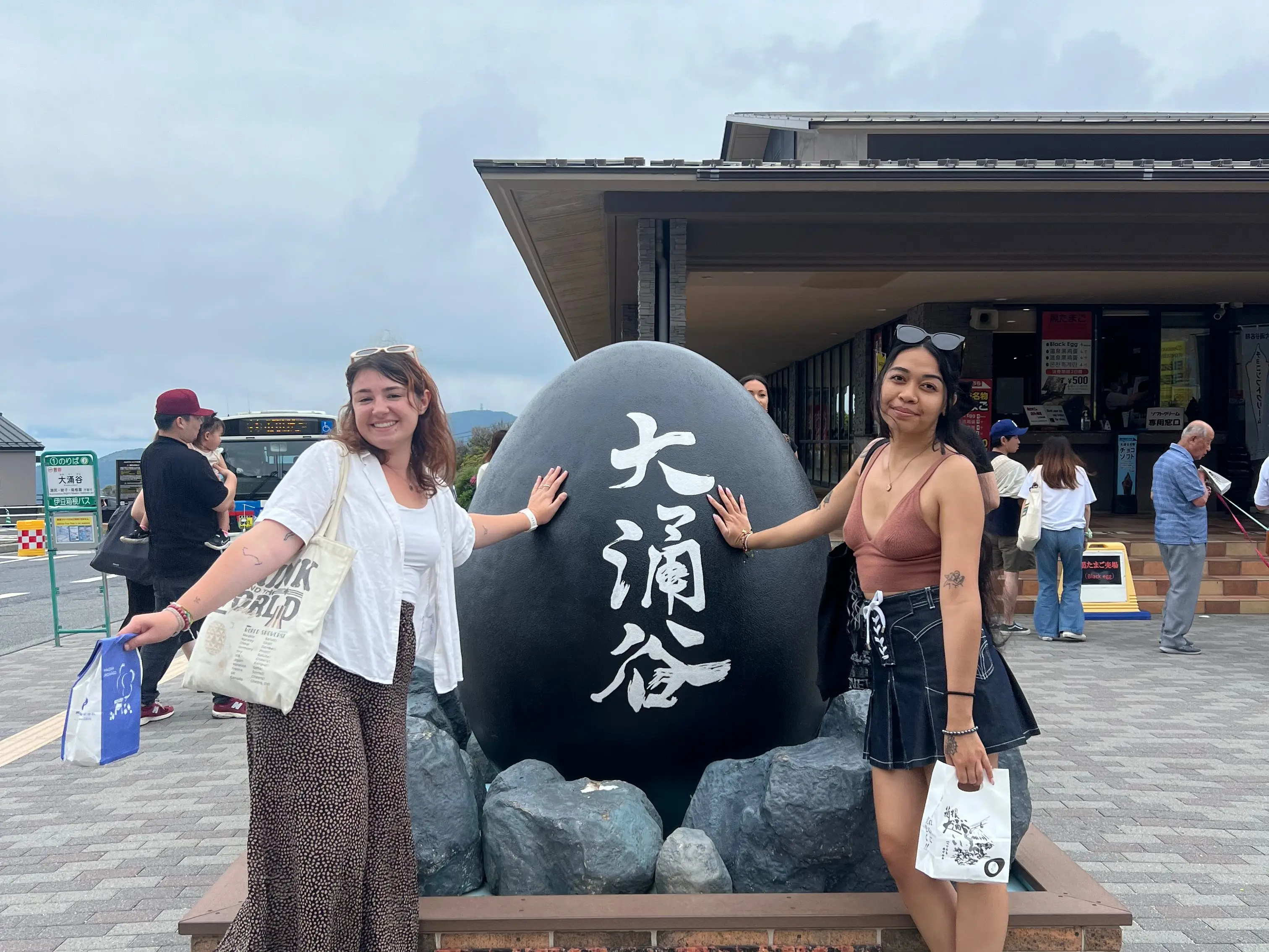 Two women posing in Japan.