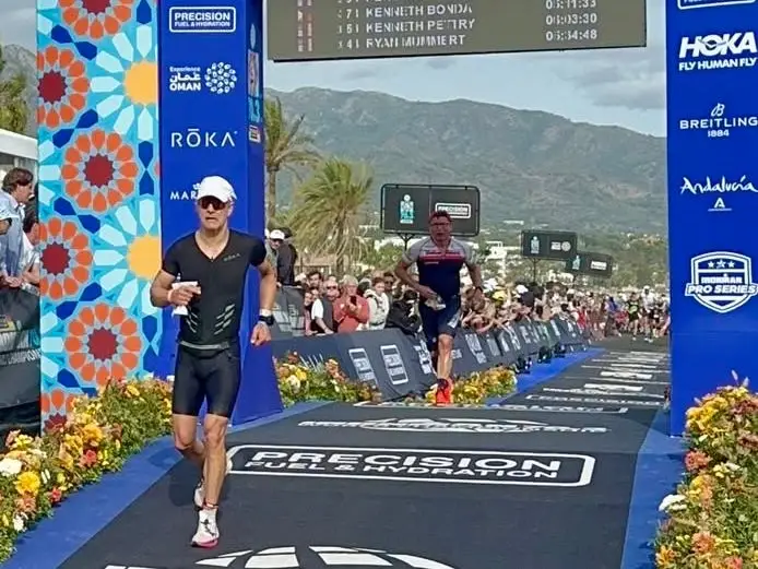 Ken Fine finishing an Ironman