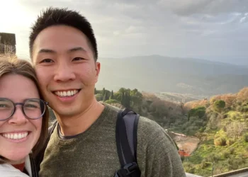 My husband and I both want to move abroad. We just can’t agree on how much money we should save first.