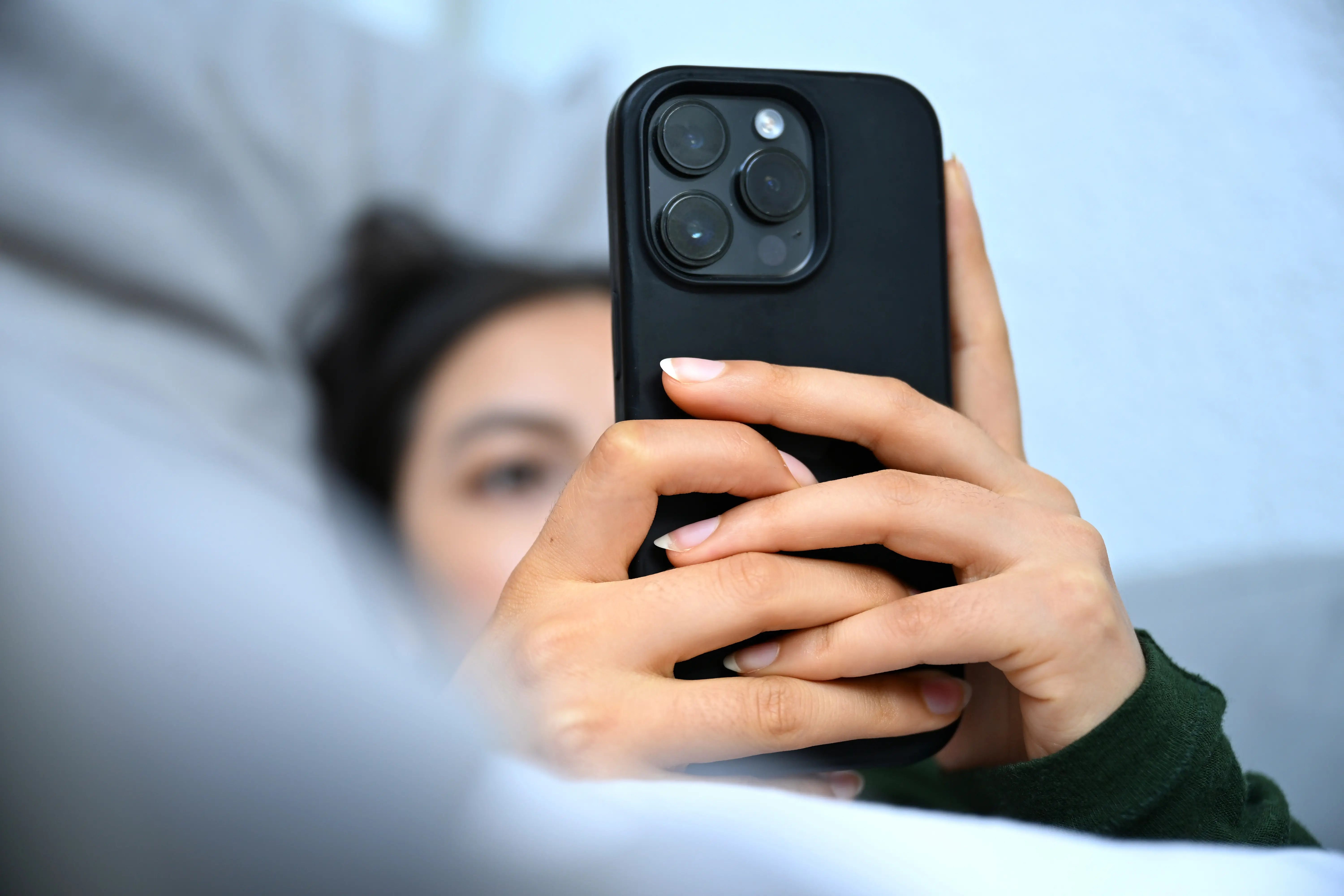 A woman on her phone.
