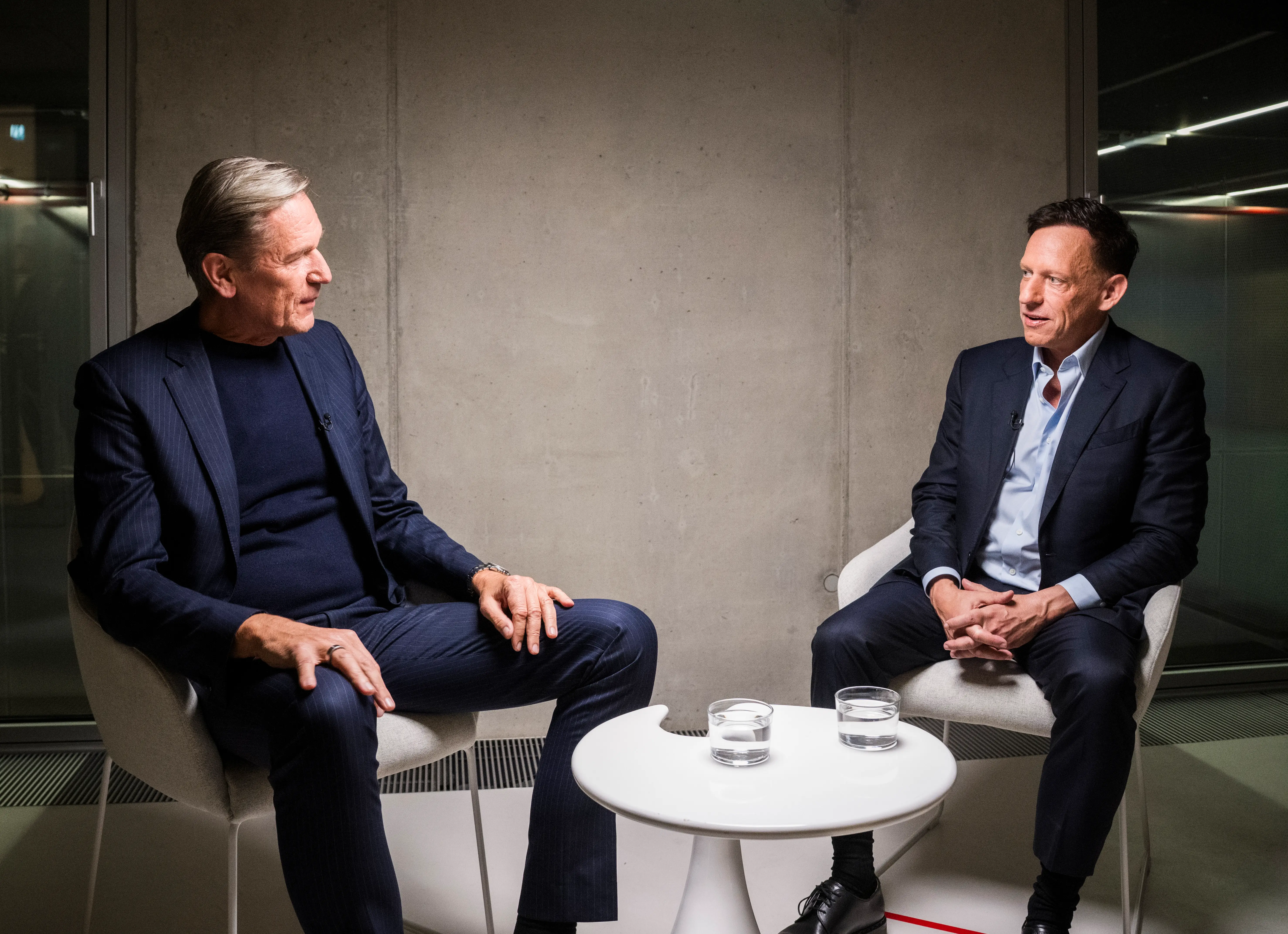 Mathias Döpfner and Peter Thiel are pictured.