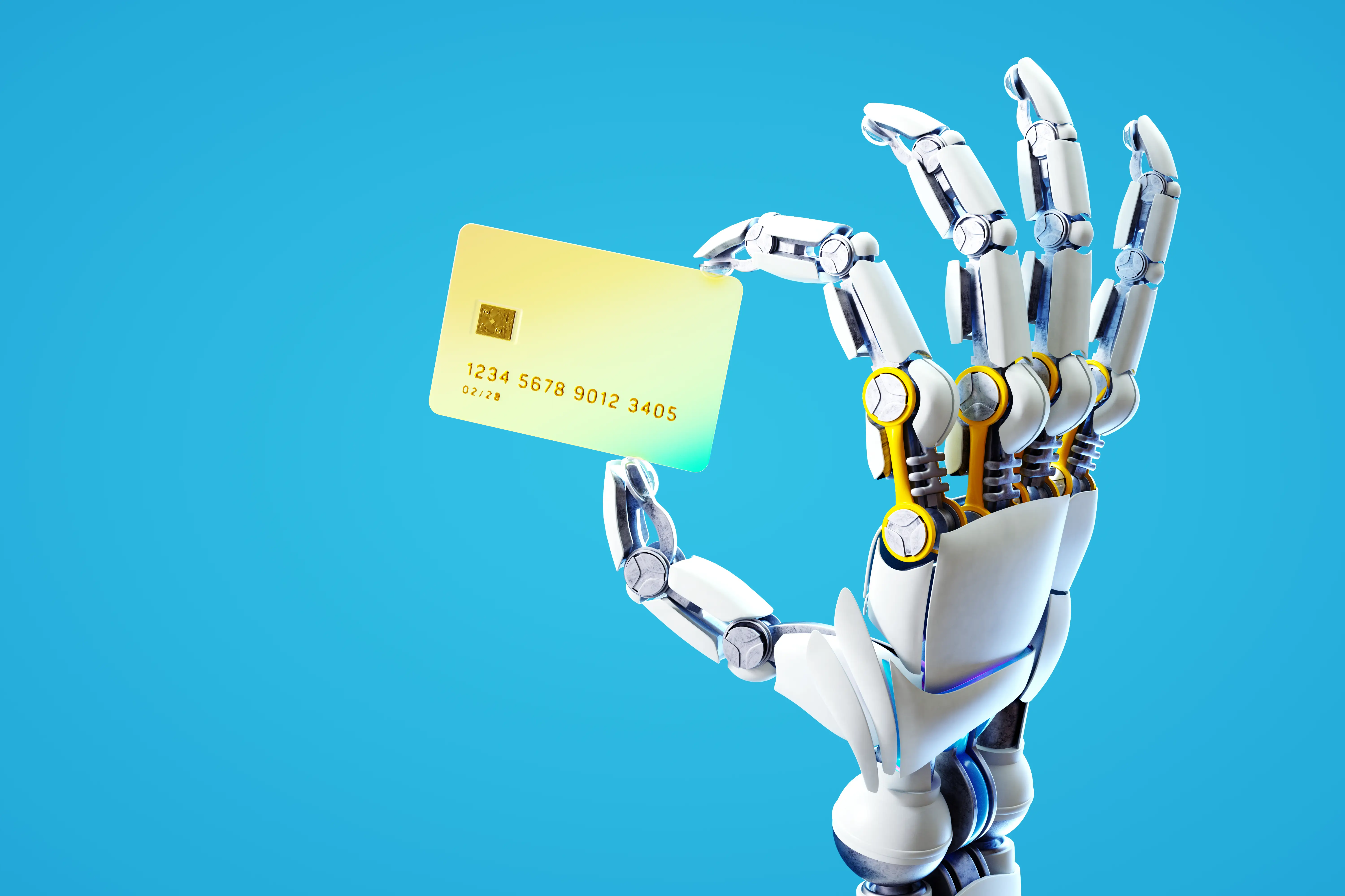 A robotic hand holds a golden credit card between its index finger and thumb.