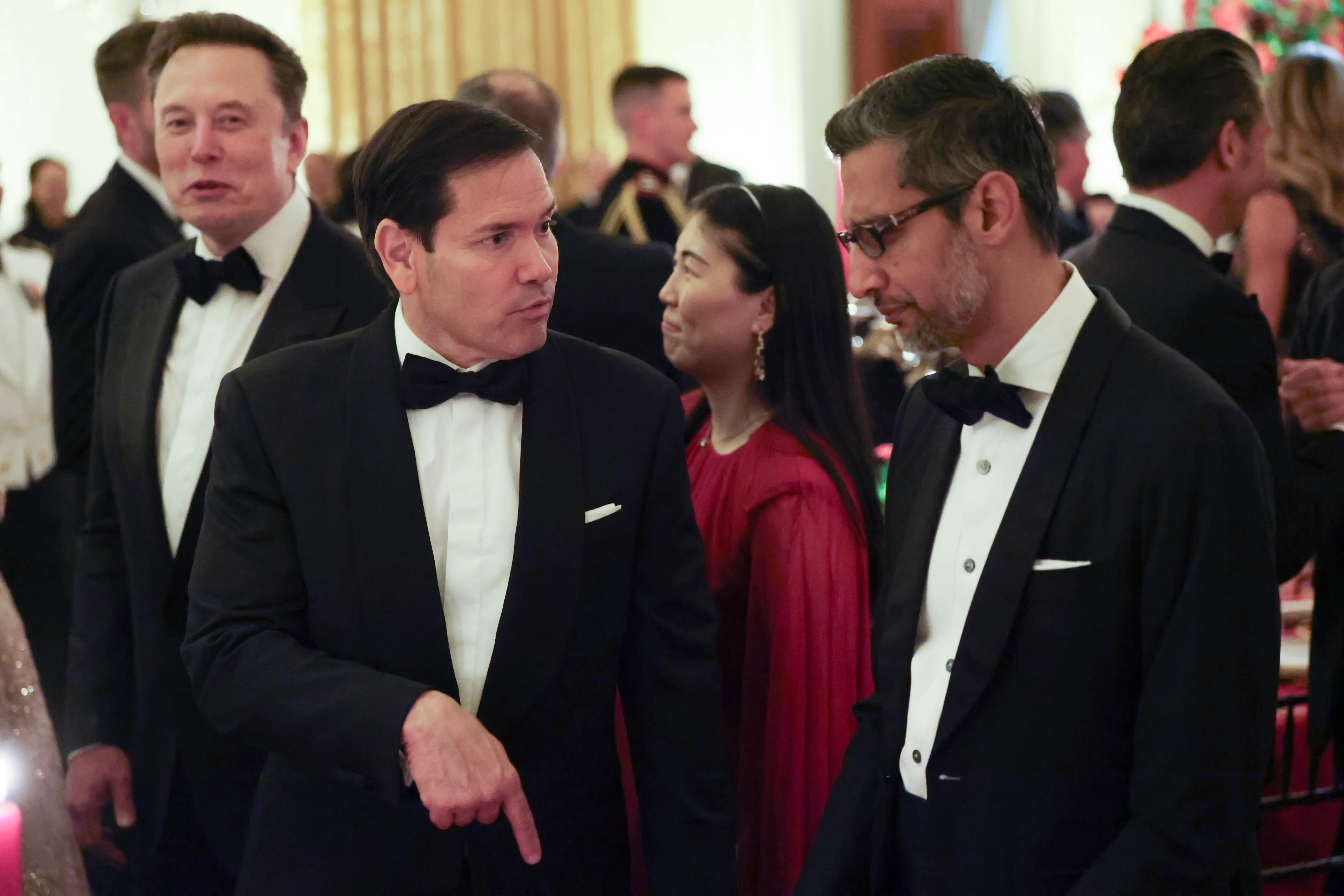 U.S. Secretary of State Marco Rubio speaks with Sundar Pichai, Google, CEO, as they attend a state dinner hosted by U.S. President Donald Trump in the East Room of the White House on September 24, 2026 in Washington, DC. President Trump is hosting President Xi for a three-day state visit to Washington, DC where the leaders are expected to discuss trade practices, artificial intelligence and furthering 