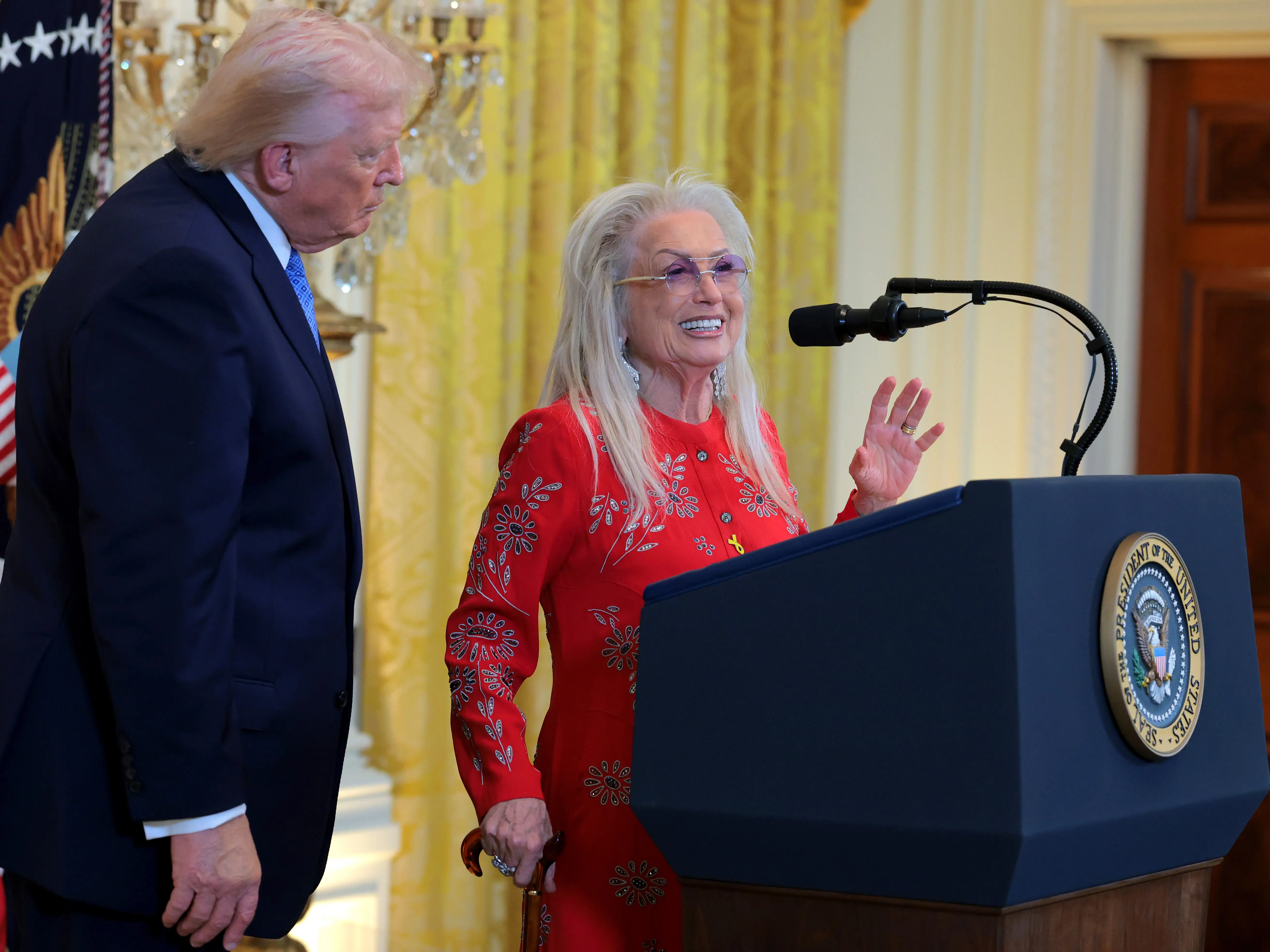 Miriam Adelson speaks alongside Donald Trump