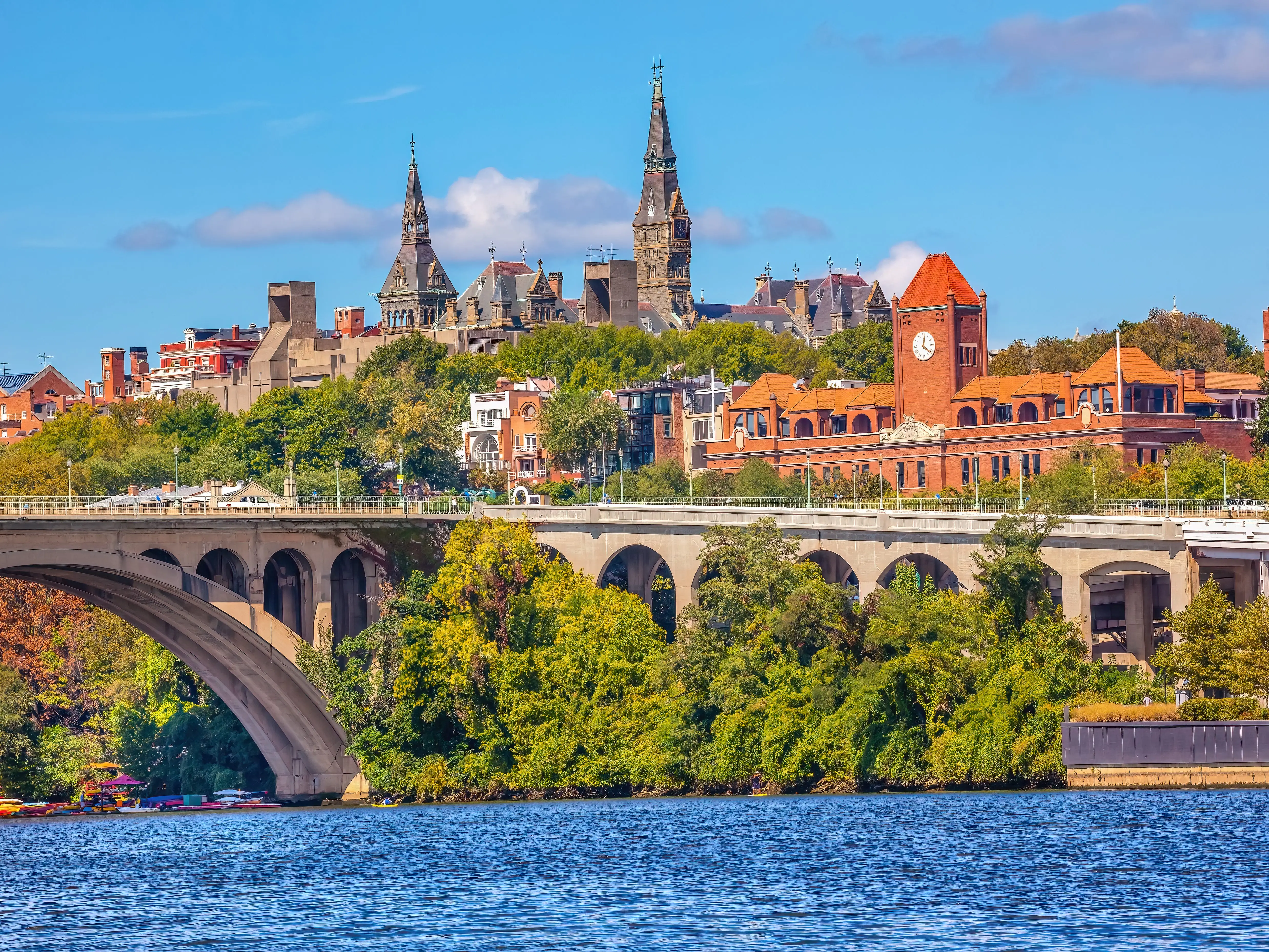 Key Bridge Potomac River Georgetown University Washington DC from Roosevelt Island. Completed in 1923 this is the oldest bridge in Washington DC.