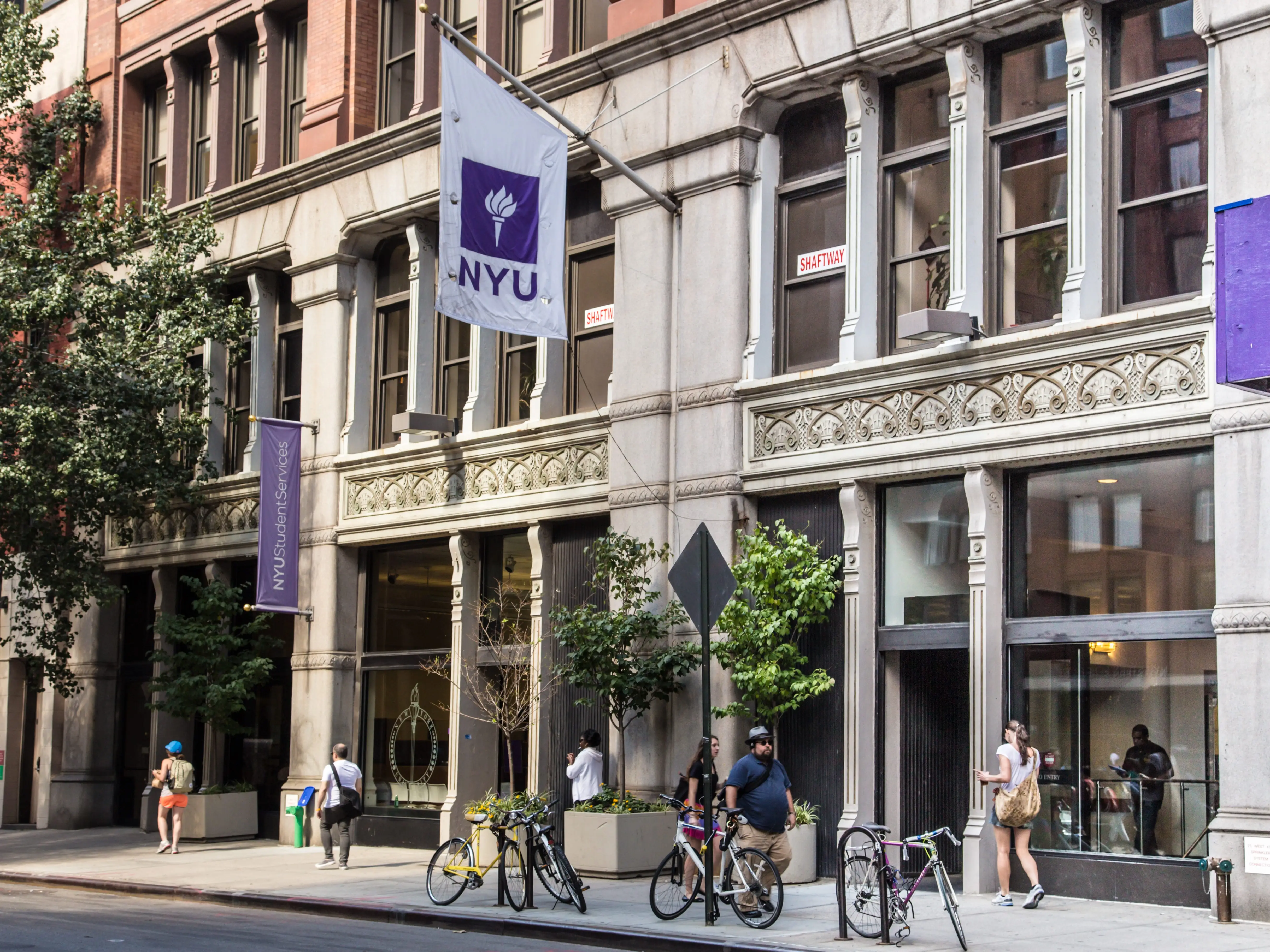 New York City, New York, USA - September 13, 2013: Street view of New York University NYU in Greenwich Village Manhattan. There are people visible in this image.