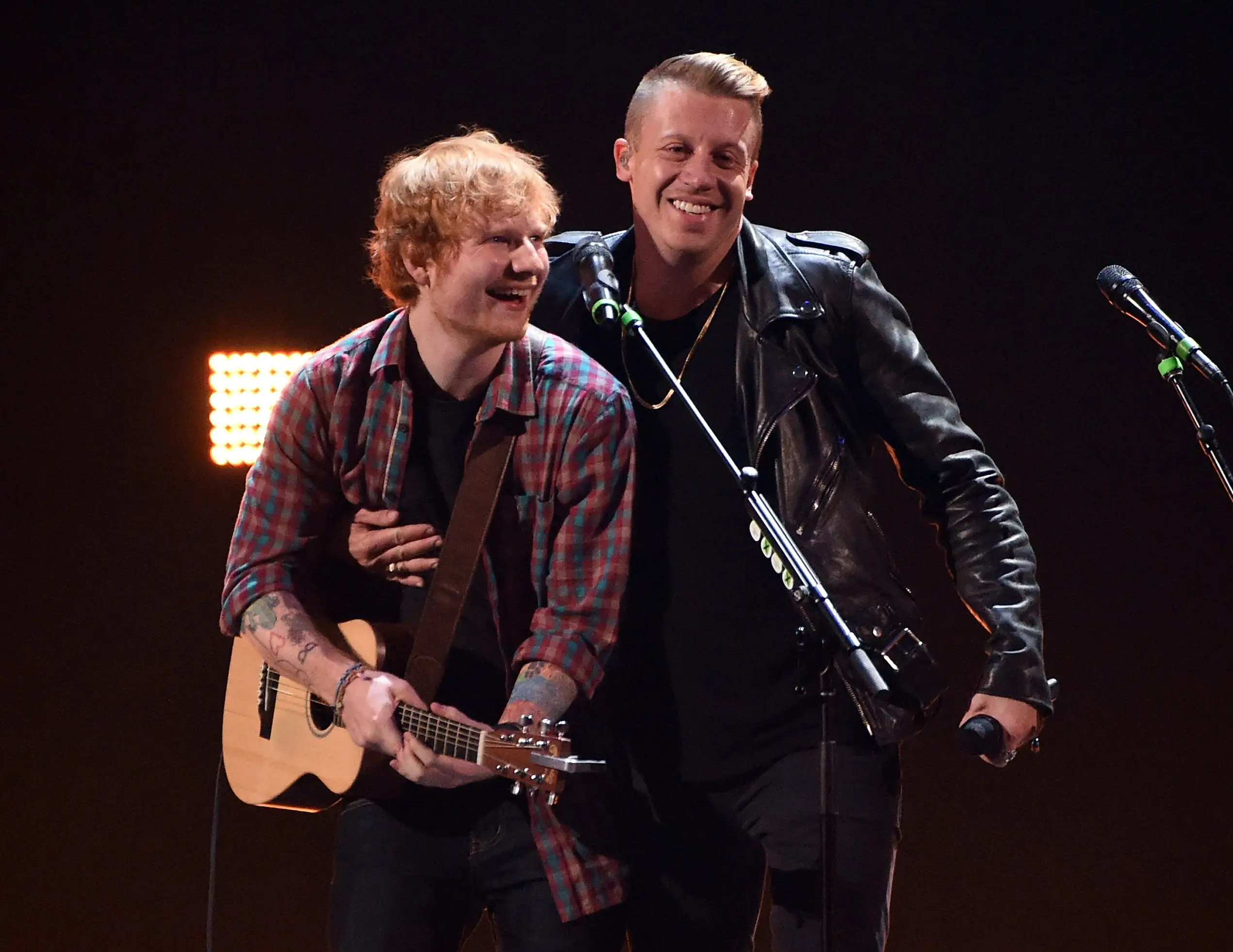 Ed Sheeran and Macklemore pictured together in 2014.