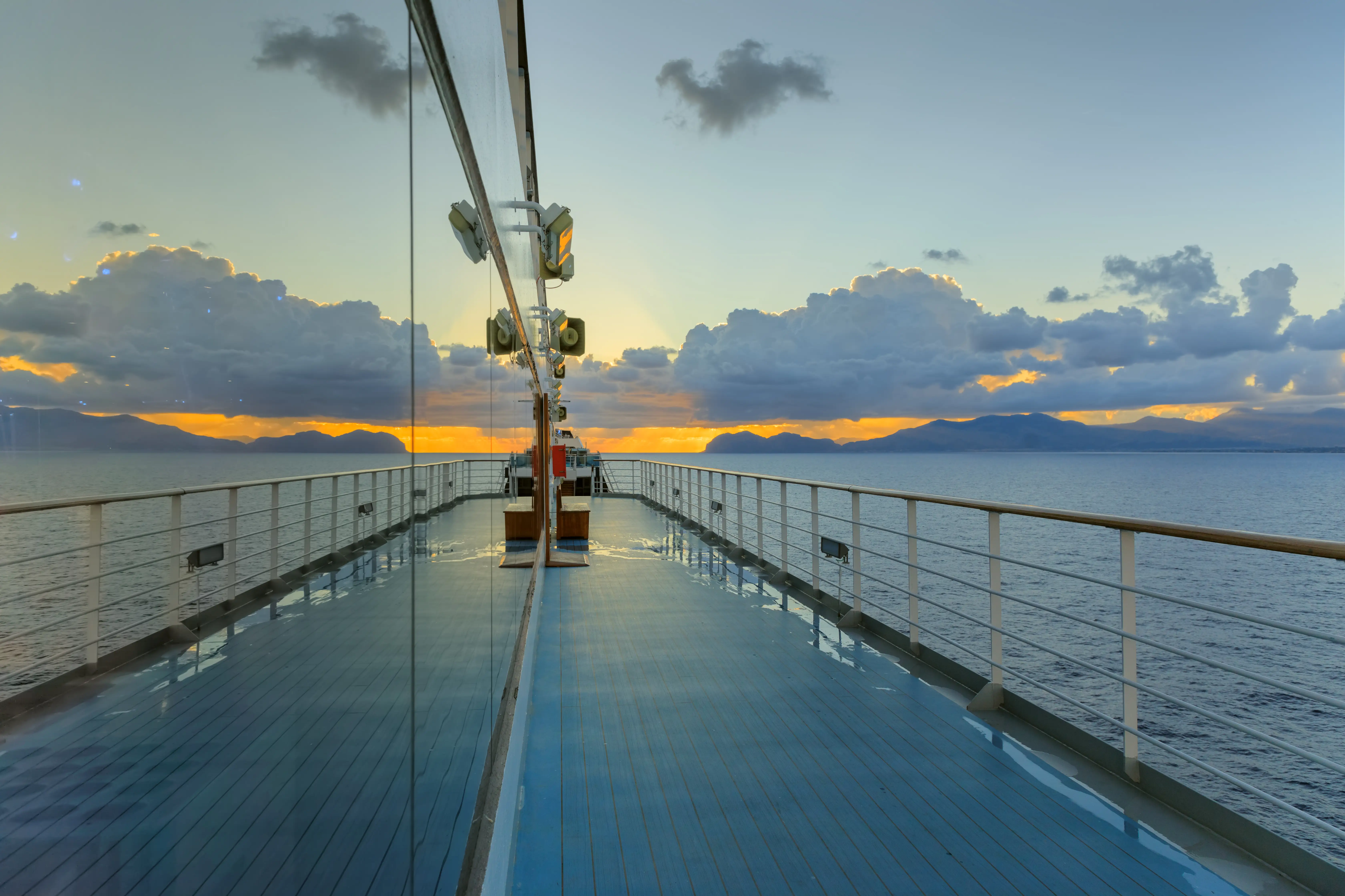 Cruise ship deck at sunset