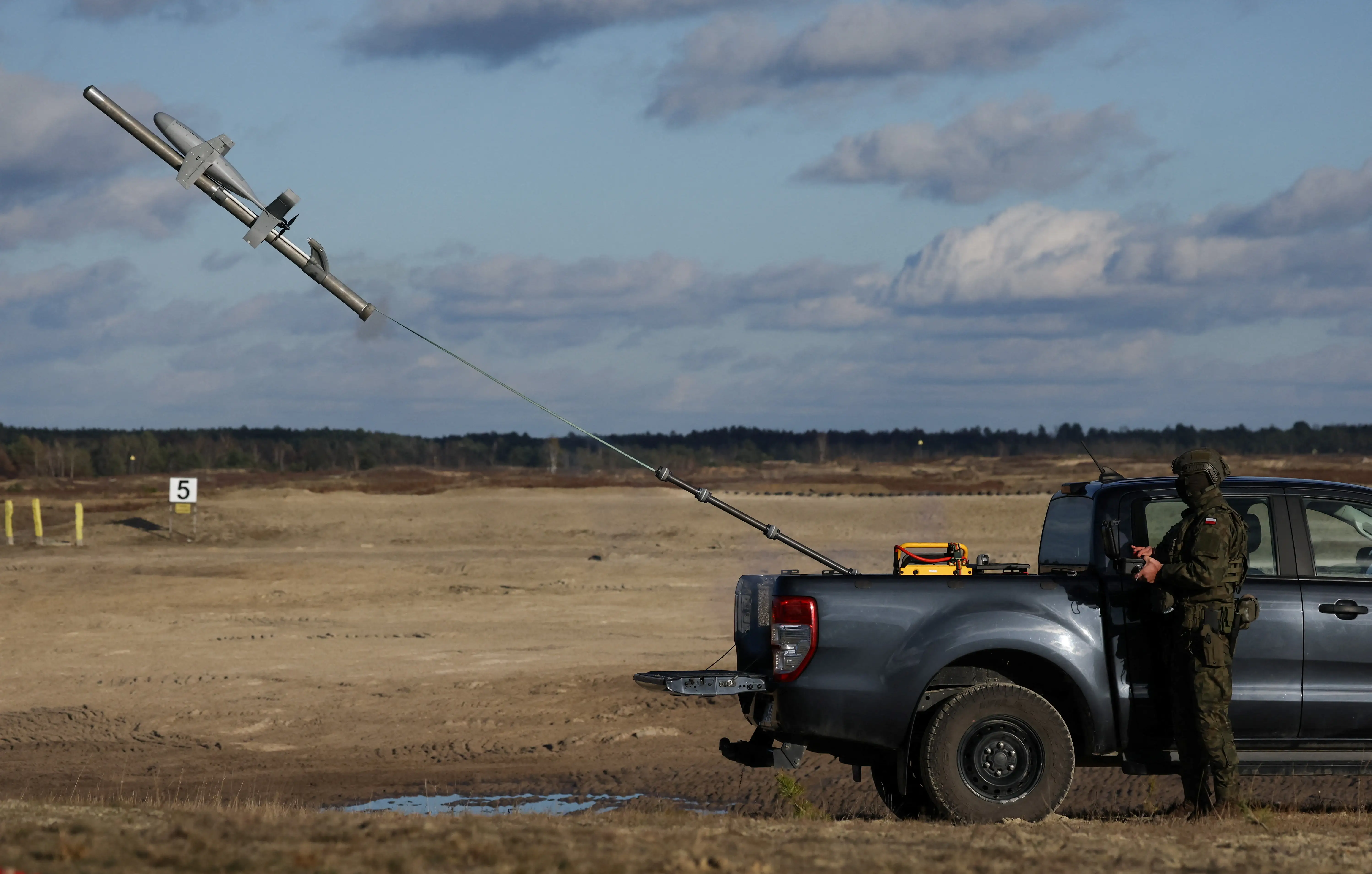 A soldier operates an AS3 interceptor, part of the Merops system.