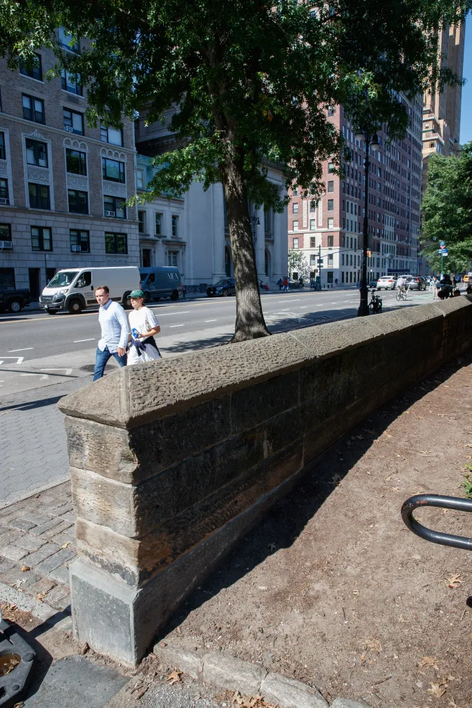 A stone wall along the edge of Central Park in New York City.