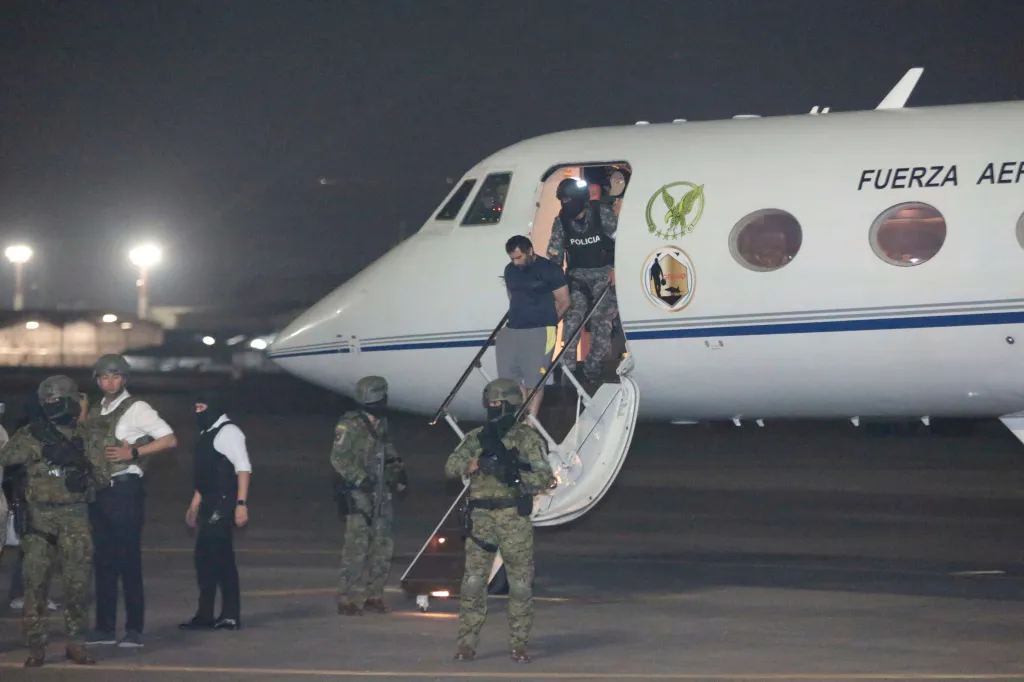 Escorted by soldiers and police officers, Adolfo 