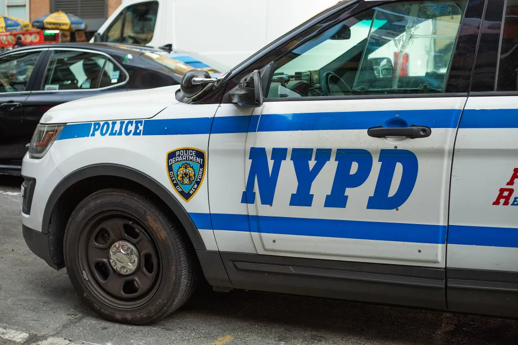 NYPD patrol car on a street in New York City.