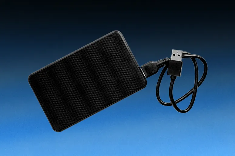 Image may contain: Adapter, Electronics, Speaker, Computer Hardware, and Hardware