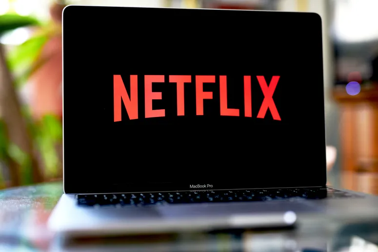 The Netflix Inc. logo on a laptop computer arranged in the Brooklyn Borough of New York, U.S., on Saturday, Oct. 16, 2021. Netflix Inc. is scheduled to release earnings figures on October 19. 