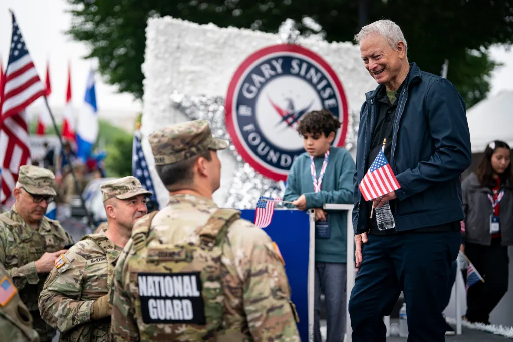 Sinise speaks with members of the US National Guard during the Freedom 250 National Memorial Day Parade on May 25 in Washington, DC.