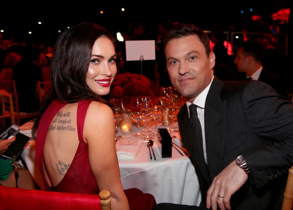 Actors Megan Fox and Brian Austin Green at an event.