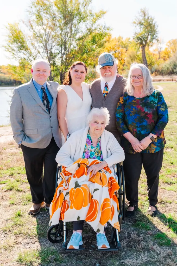 Alan Smith, Megan Ghekiere, Dana Smith, Barbara Smith, and Evelyn Smith (center) posing for a photo.
