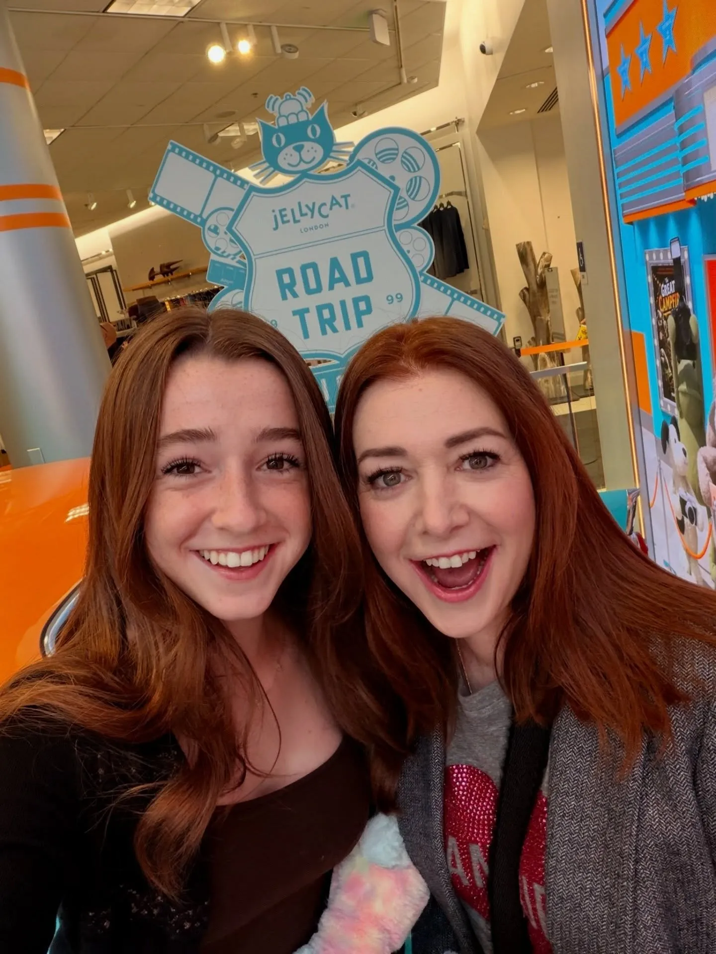 Alyson Hannigan and her daughter Keeva smiling for a selfie.