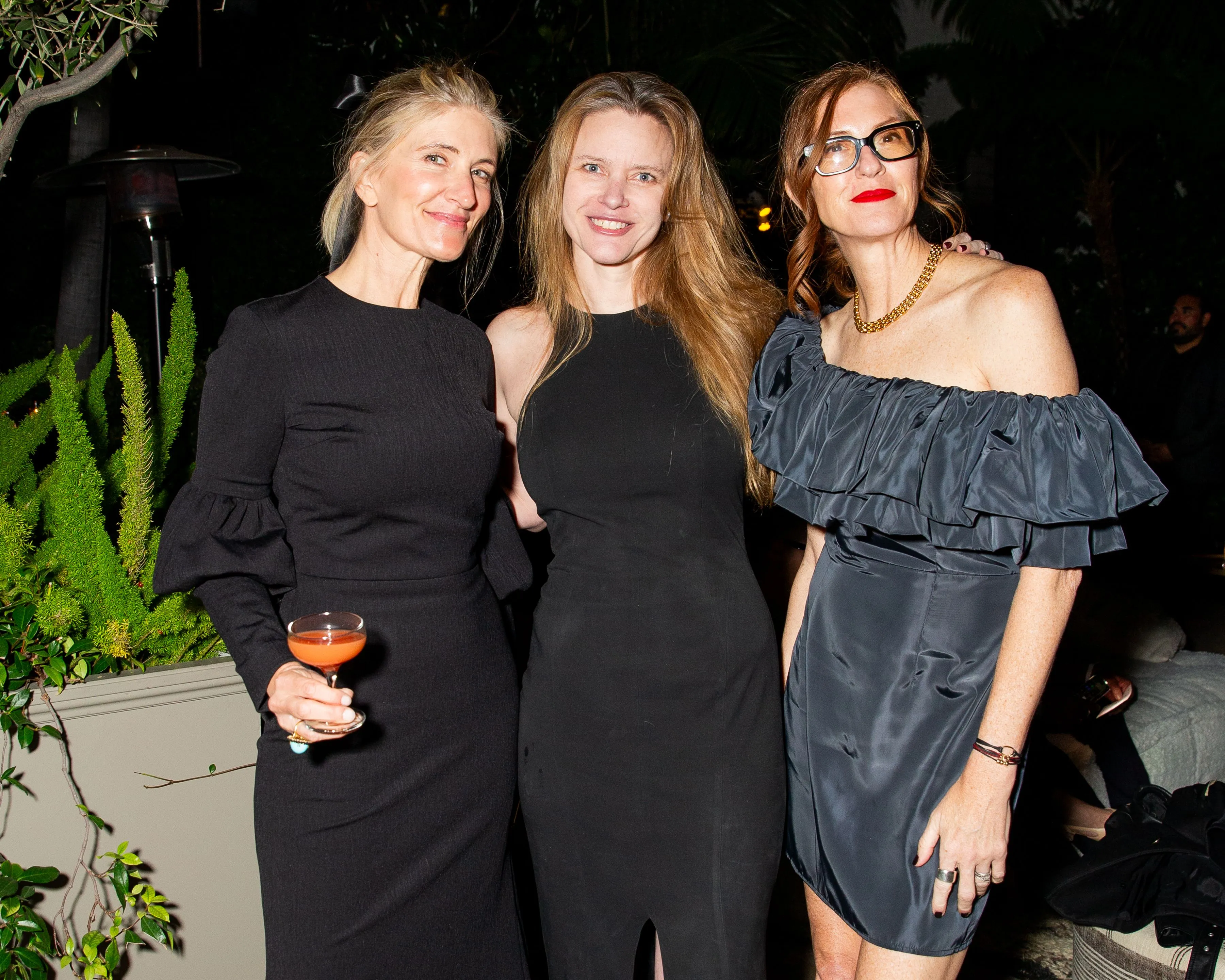 Amy Neunsinger, Justine Musk, and April Uchitel posing together.