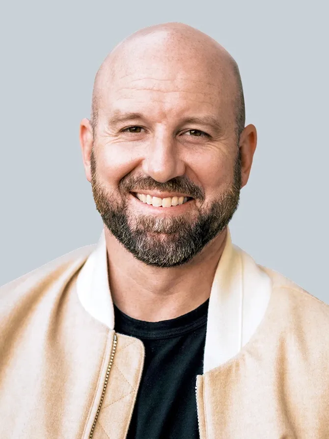 Headshot of Meta Chief Technology Officer Andrew