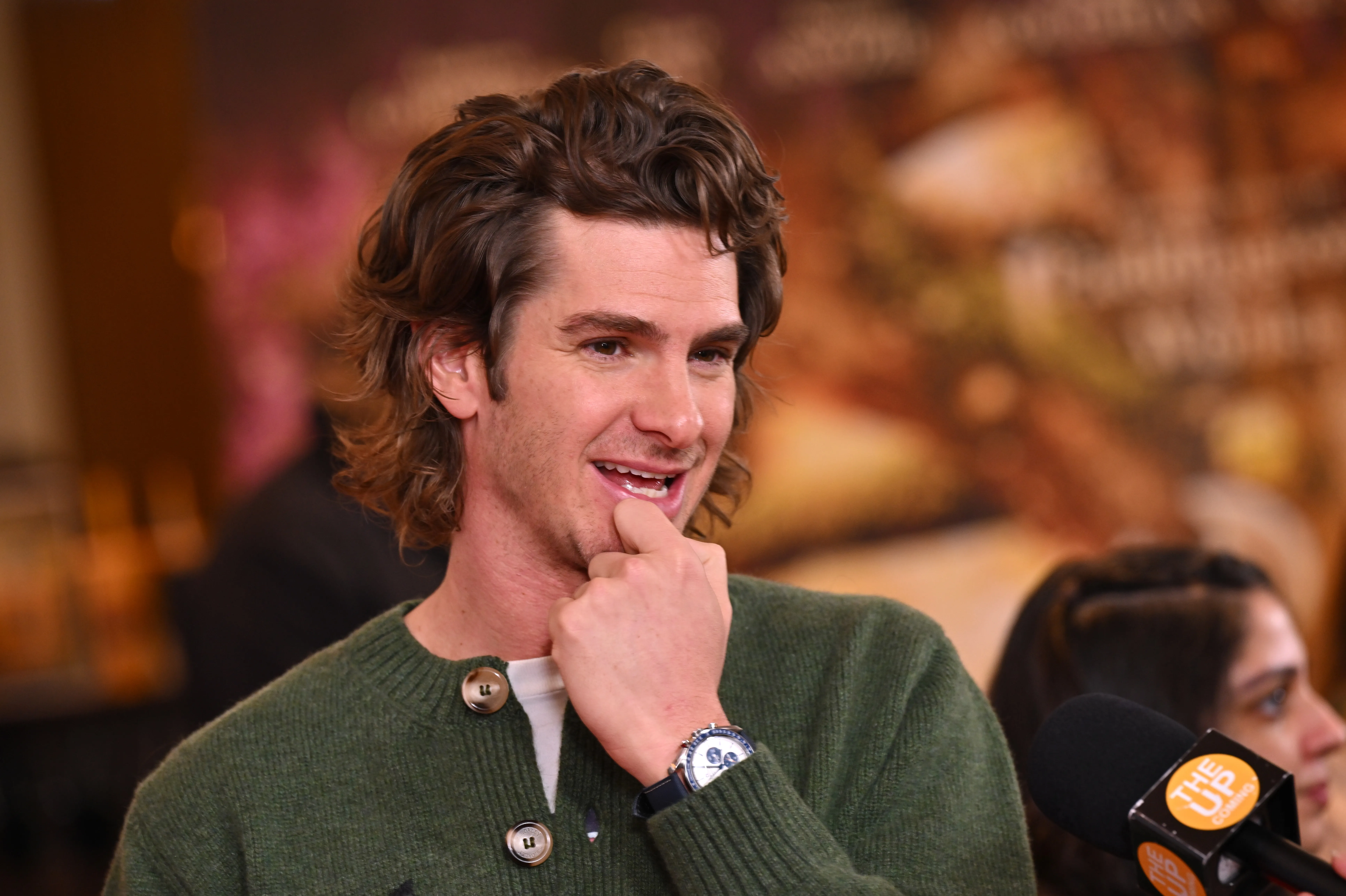 Andrew Garfield smiles at 