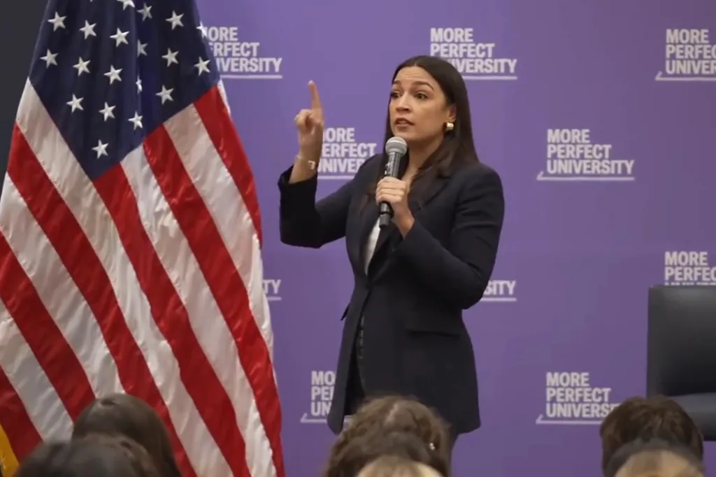 Alexandria Ocasio-Cortez speaking with students about relevant issues during a town hall.